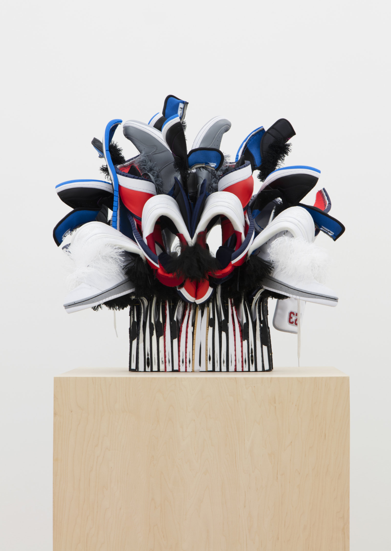 Brian Jungen, Owl Drugs, 2016, nike air jordans, brass, 25 x 23 x 21 in. (64 x 57 x 53 cm). Courtesy Casey Kaplan, New York