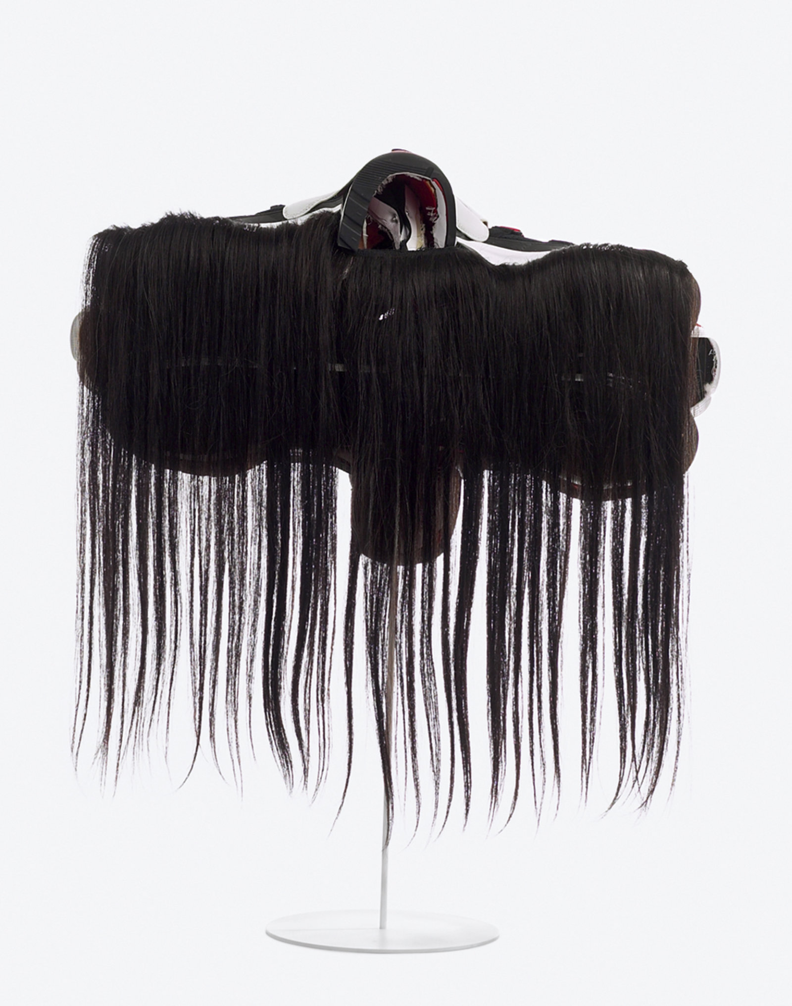 Brian Jungen, Prototype for New Understanding #11, 2002, nike air jordans, human hair, 26 x 23 x 10 in. (67 x 58 x 25 cm)