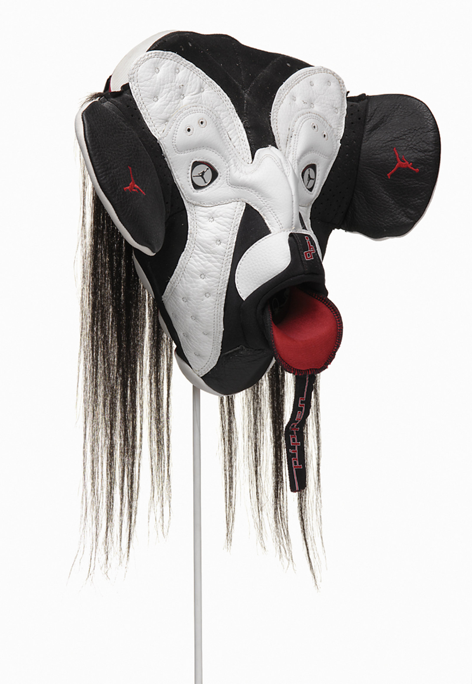 Brian Jungen, Prototype for New Understanding #4, 1999, nike air jordans, human hair, 18 x 13 x 7 in. (46 x 34 x 18 cm)