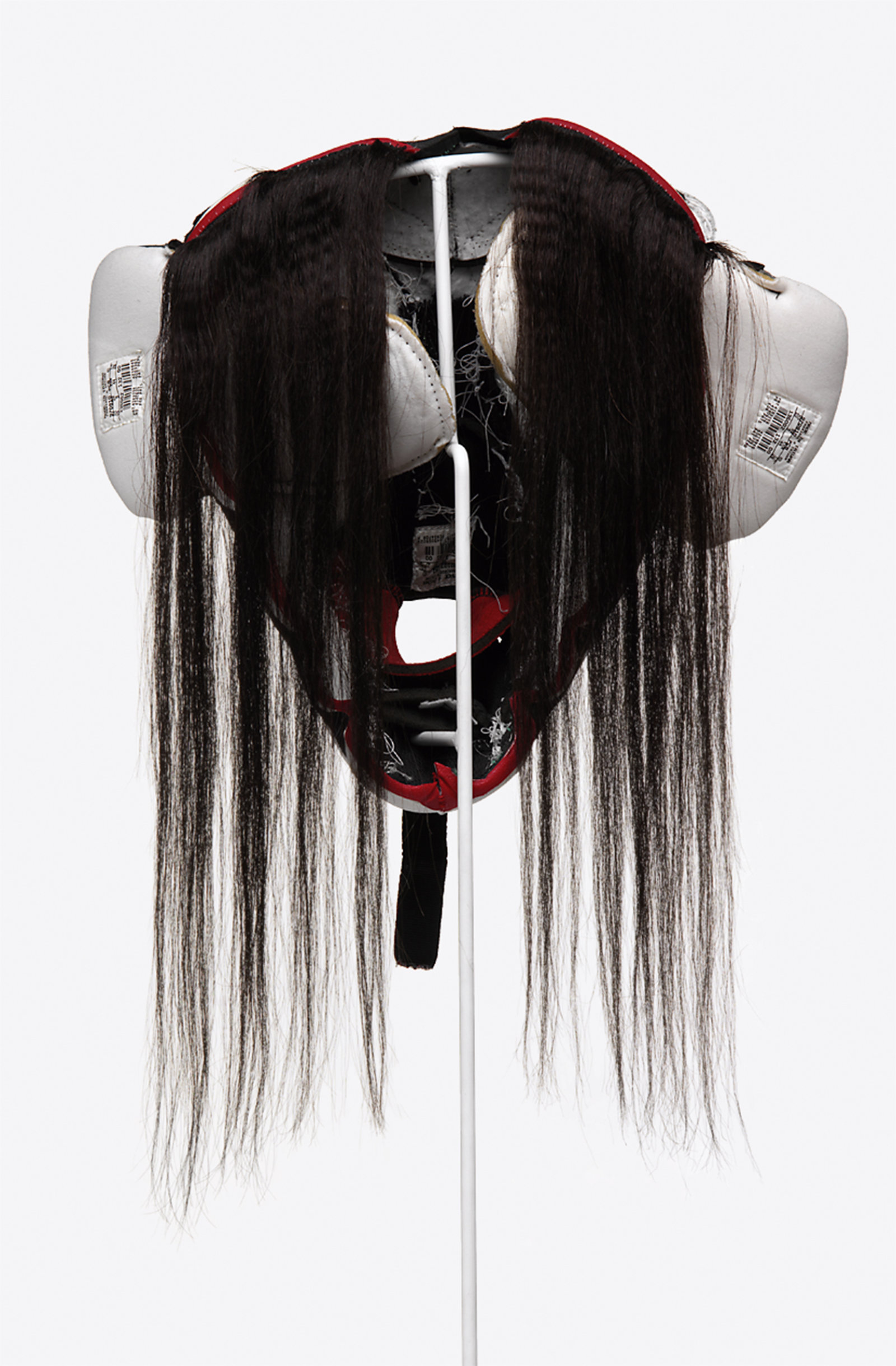 Brian Jungen, Prototype for New Understanding #4, 1999, nike air jordans, human hair, 18 x 13 x 7 in. (46 x 34 x 18 cm)