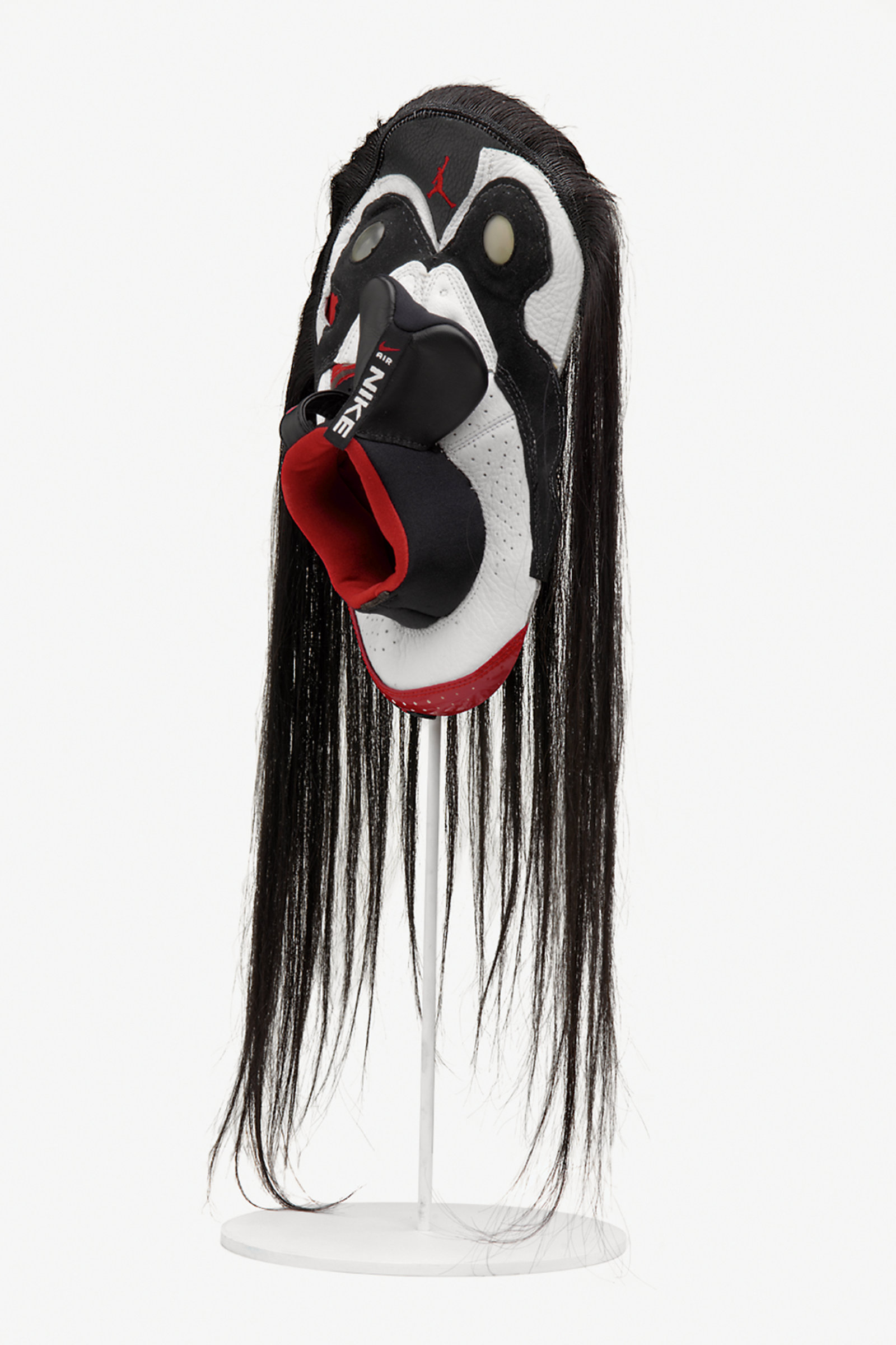 Brian Jungen, Prototype for New Understanding #9, 1999, nike air jordans, human hair, 24 x 10 x 5 in. (61 x 25 x 13 cm)