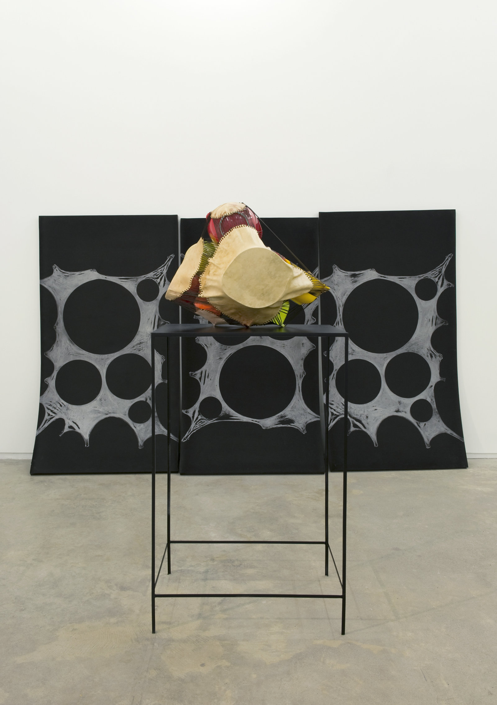 Brian Jungen, Subject, Silver, Prism, 2011, foam, silver relief ink, plastic bowls, deer hide, tarred twine, steel, 78 x 120 x 300 in. (198 x 305 x 762 cm)