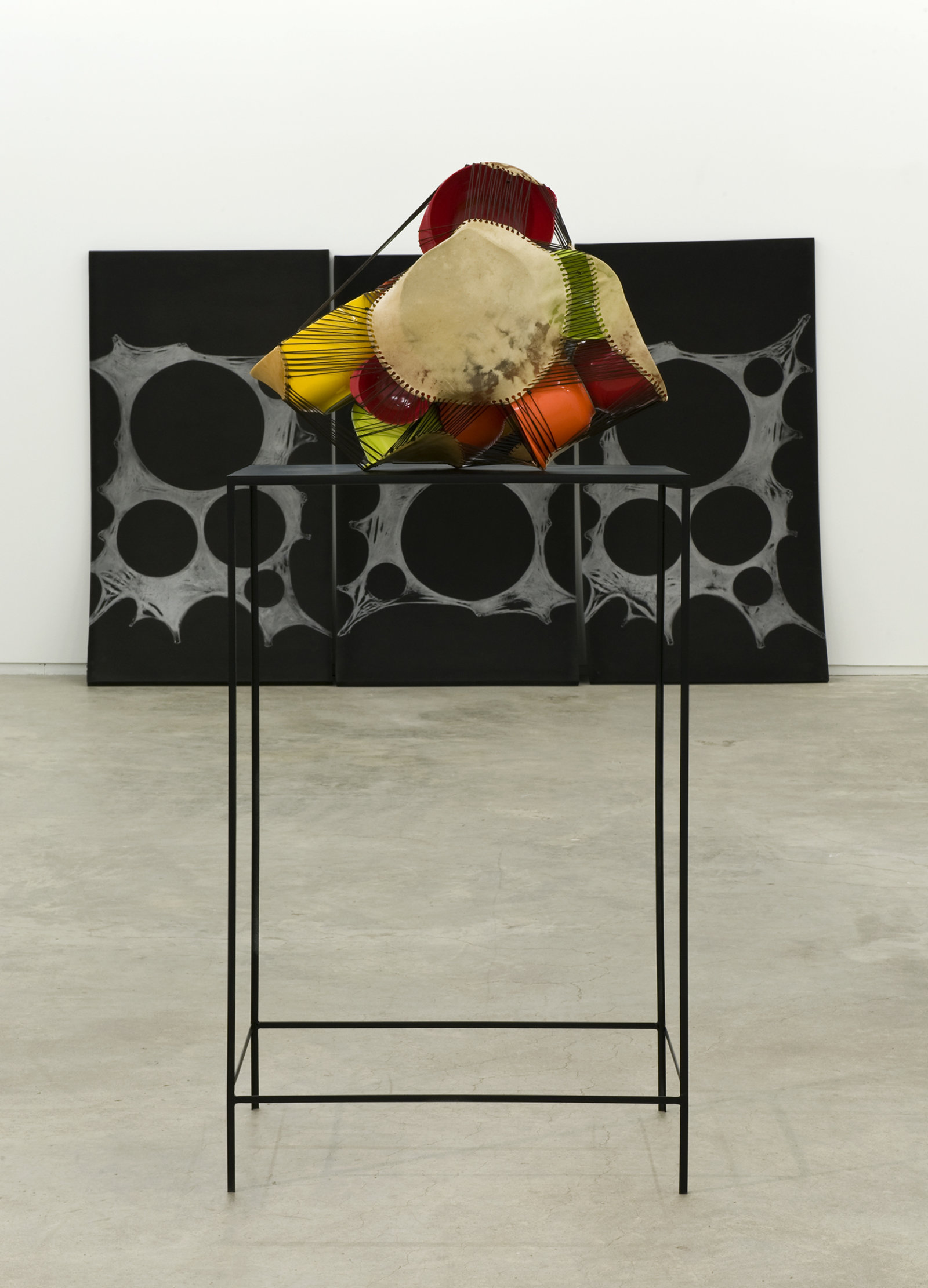Brian Jungen, Subject, Silver, Prism, 2011, foam, silver relief ink, plastic bowls, deer hide, tarred twine, steel, 78 x 120 x 300 in. (198 x 305 x 762 cm)