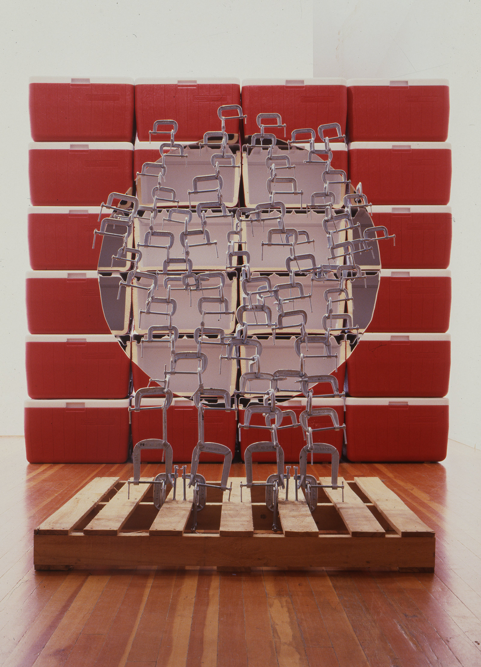 Brian Jungen, Void, 2002, coleman coolers, wooden palette, metal clamps, light, 87 x 96 x 27 in. (221 x 244 x 69 cm)
