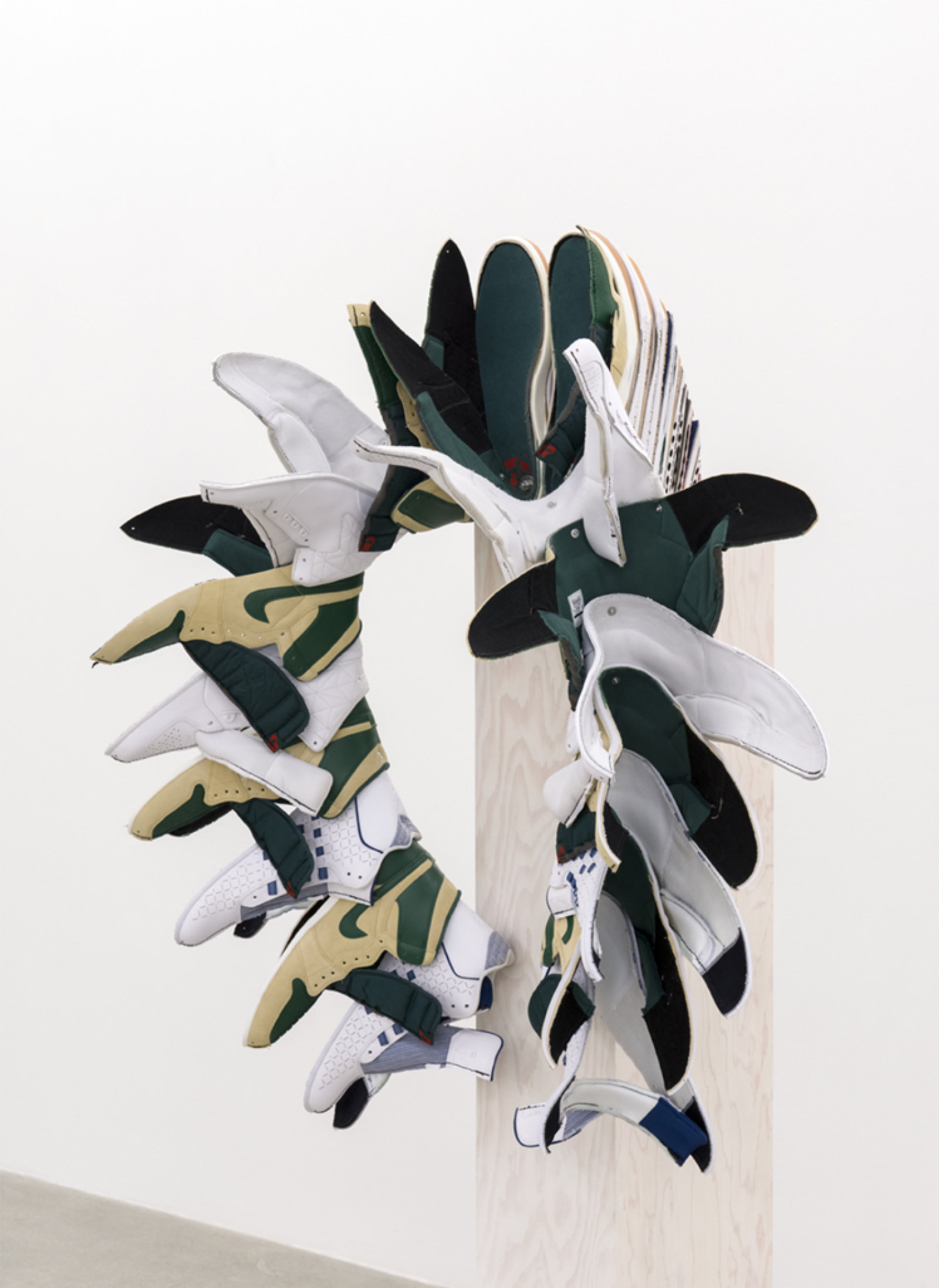 Brian Jungen, Walk This Way (Fall) (detail), 2015–2016, nike air jordans, painted fir plywood, stainless steel, 75 x 24 x 24 in. (191 x 61 x 61 cm)