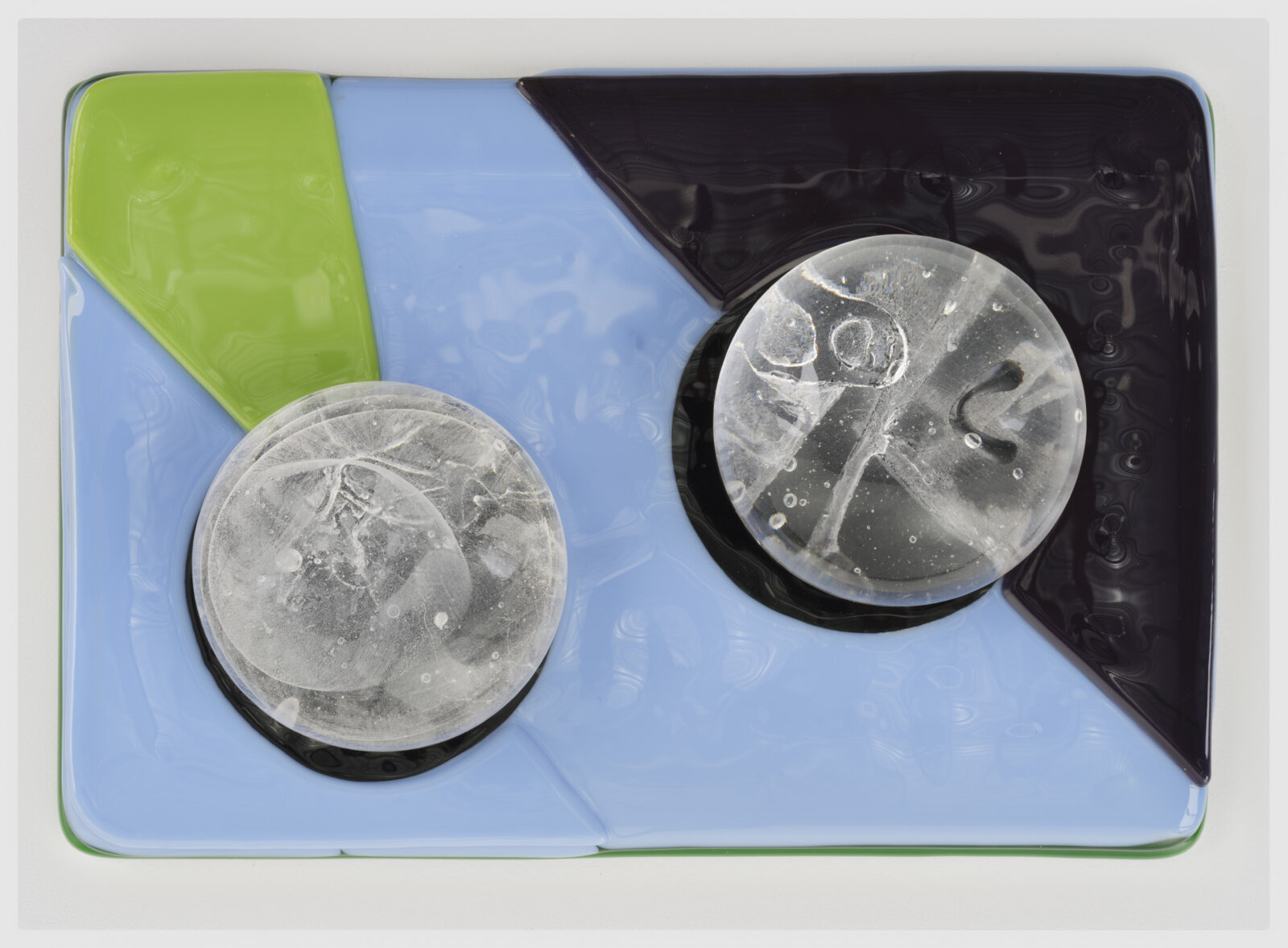 Devon Knowles, Is, Was, Here, 2022, glass, 3 parts, yellow 3 x 10 x 7 in. (6 x 25 x 18 cm); blue 3 x 10 x 7 in. (6 x 25 x 17 cm); mint 2 x 10 x 7 in. (5 x 25 x 18 cm)