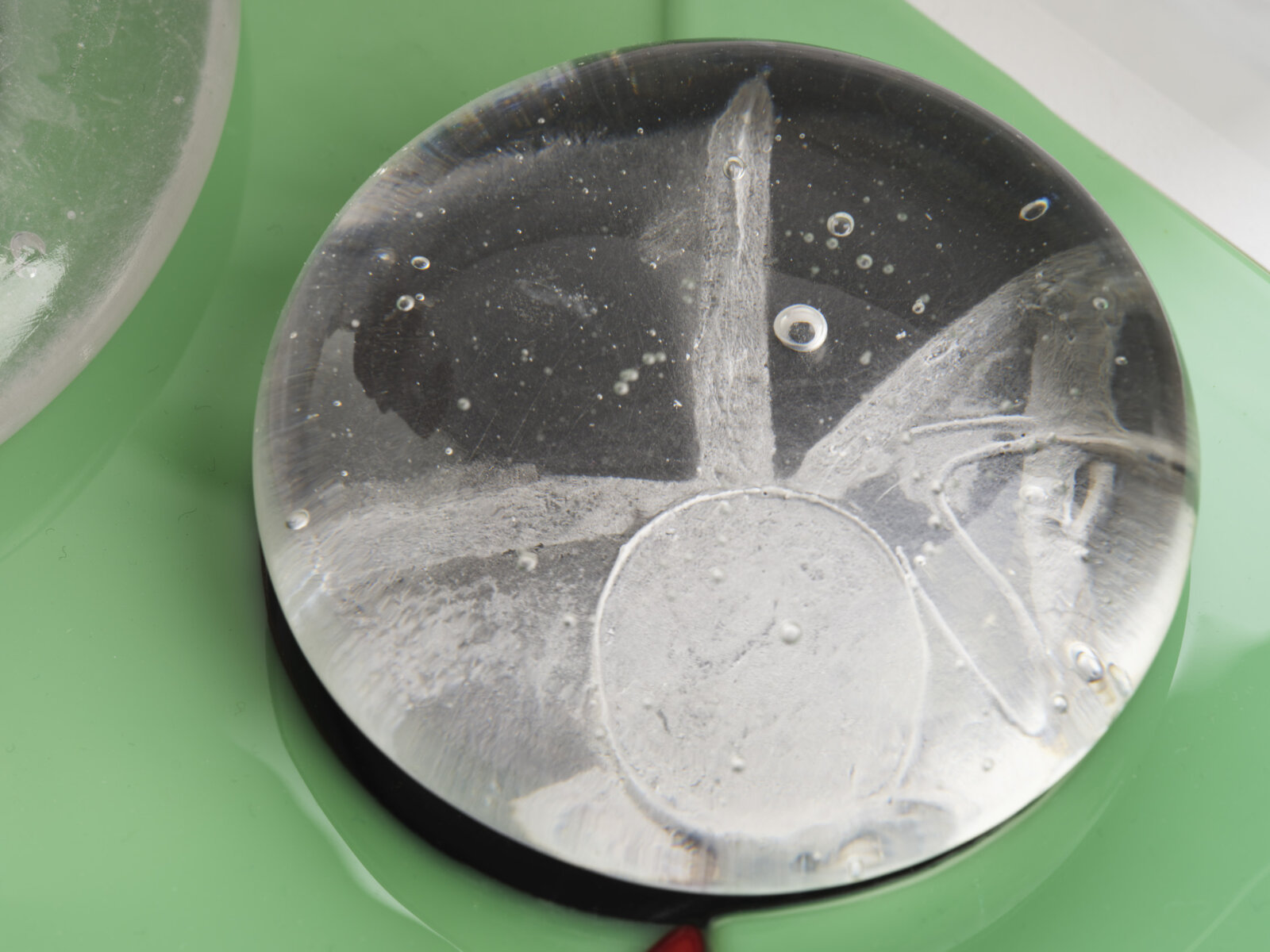 Devon Knowles, Is, Was, Here (detail), 2022, glass, 3 parts, yellow 3 x 10 x 7 in. (6 x 25 x 18 cm); blue 3 x 10 x 7 in. (6 x 25 x 17 cm); mint 2 x 10 x 7 in. (5 x 25 x 18 cm)