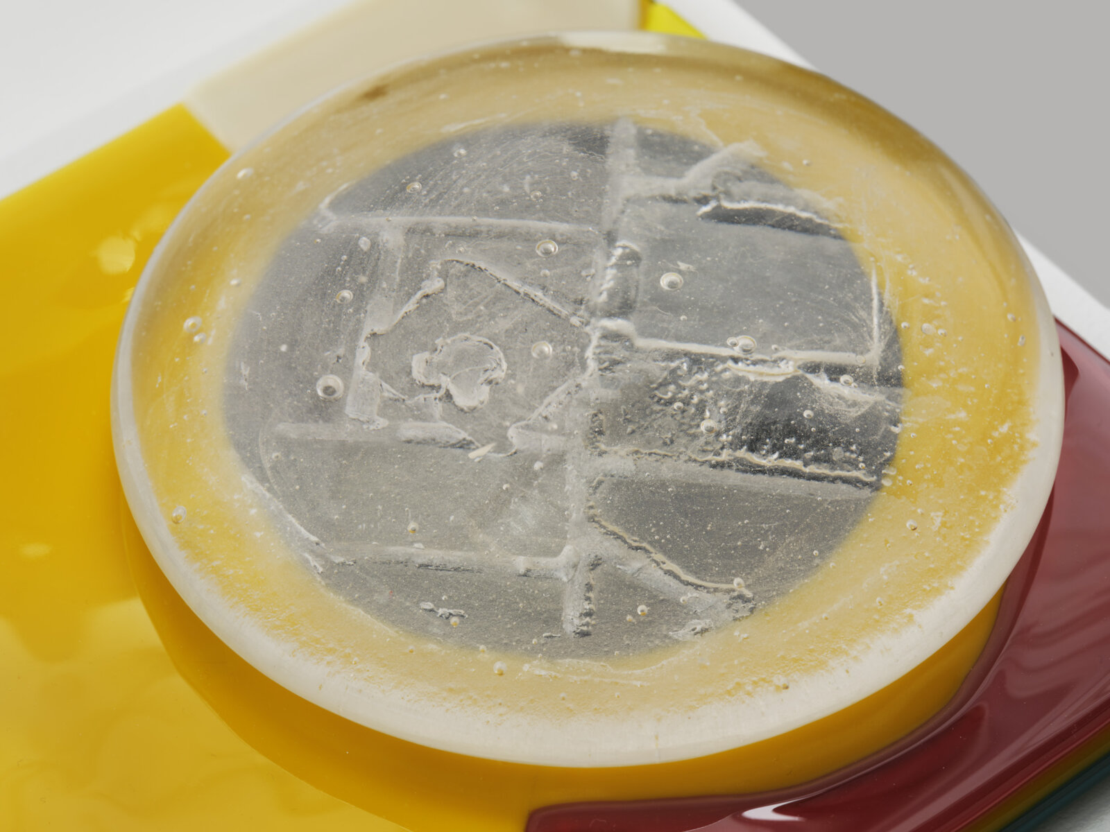 Devon Knowles, Is, Was, Here (detail), 2022, glass, 3 parts, yellow 3 x 10 x 7 in. (6 x 25 x 18 cm); blue 3 x 10 x 7 in. (6 x 25 x 17 cm); mint 2 x 10 x 7 in. (5 x 25 x 18 cm)