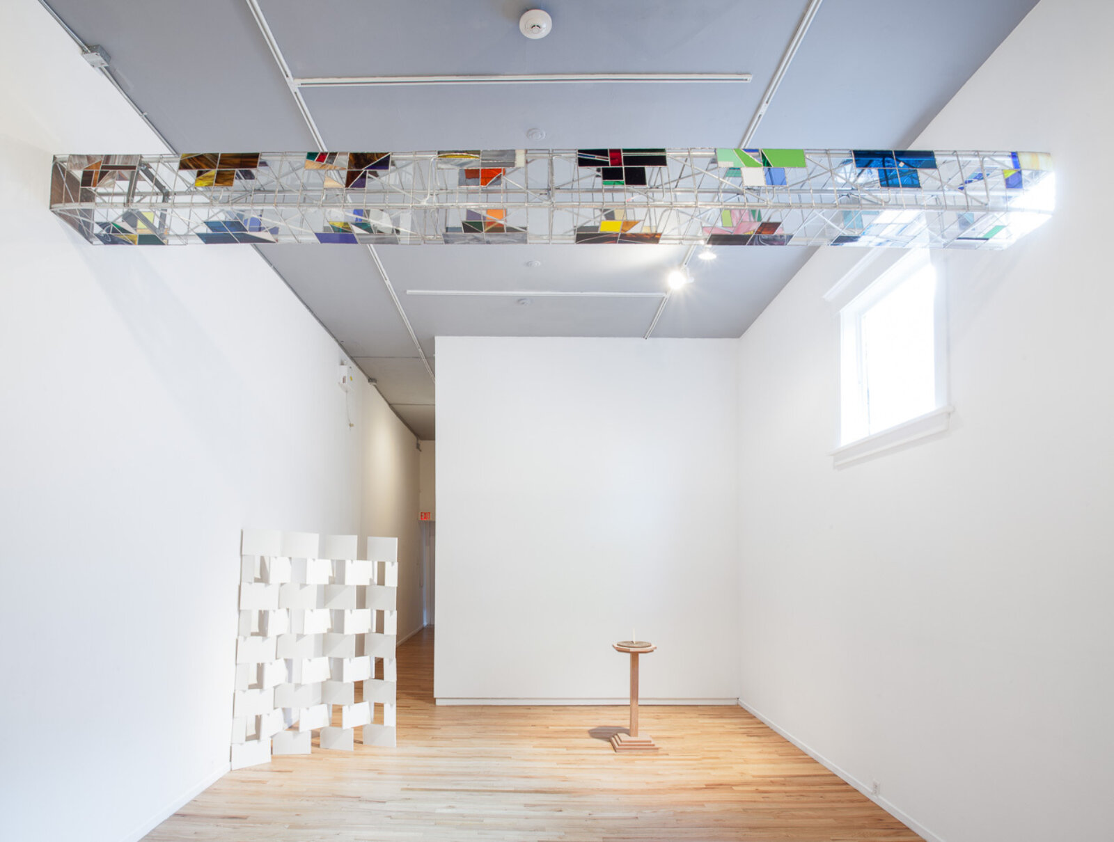 Devon Knowles, It’s Only Forever, 2013, glass, aluminum, paper, dimensions variable. Installation view, Properties, Western Front, Vancouver, Canada, 2013