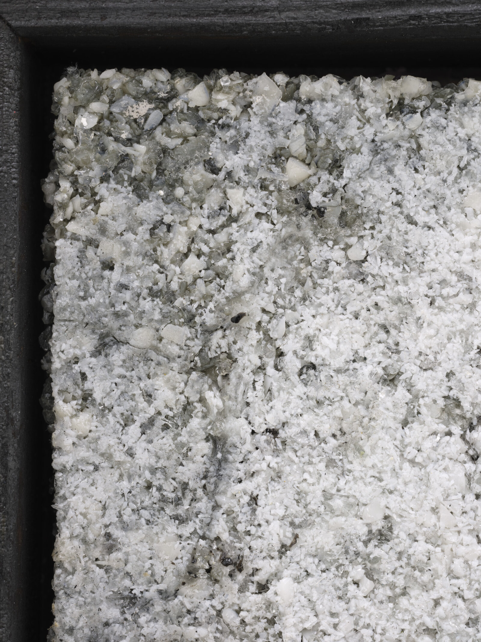 Devon Knowles, Not Wholly Itself (detail), 2024, glass frit, douglas fir, 13 x 13 x 2 in. (33 x 33 x 5 cm)