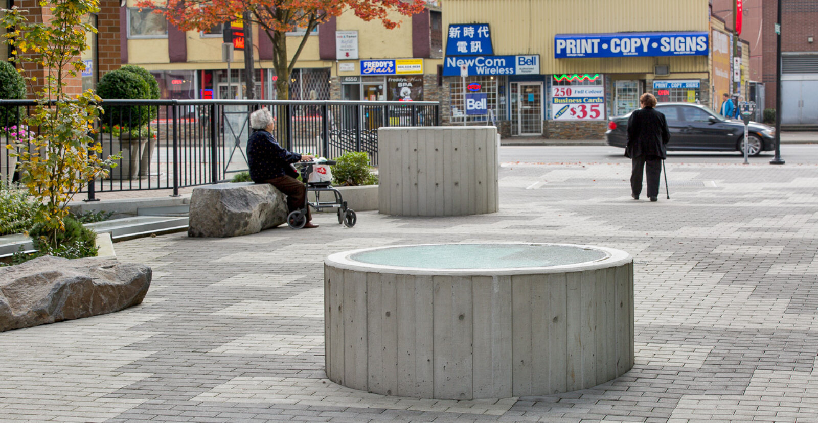 Devon Knowles, Total Running Time, 2015, concrete, glass, basalt, LED, stainless steel, native plantings, dimensions variable. Installation view, Burnaby, Canada, 2015