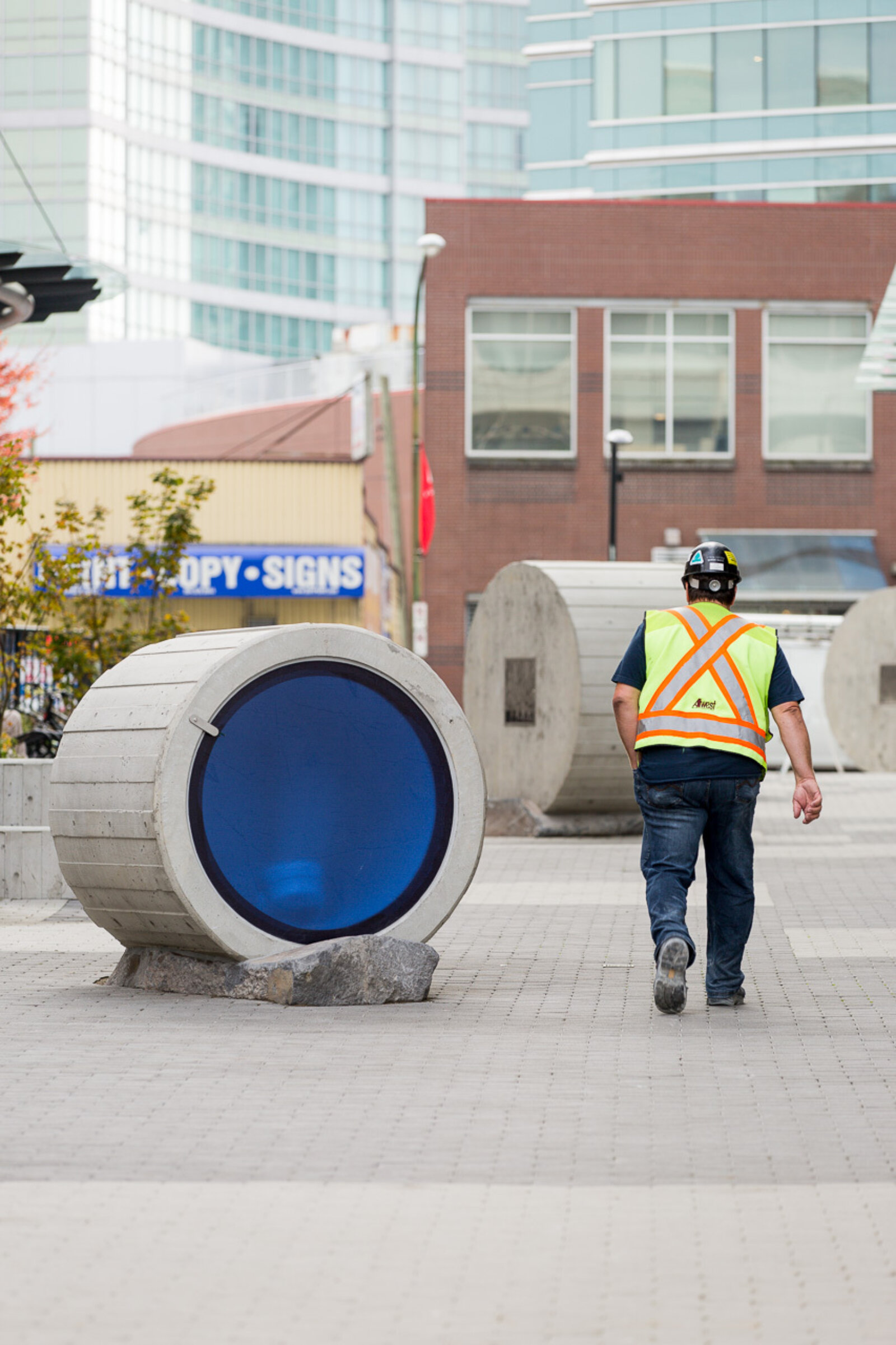 Devon Knowles, Total Running Time, 2015, concrete, glass, basalt, LED, stainless steel, native plantings, dimensions variable. Installation view, Burnaby, Canada, 2015