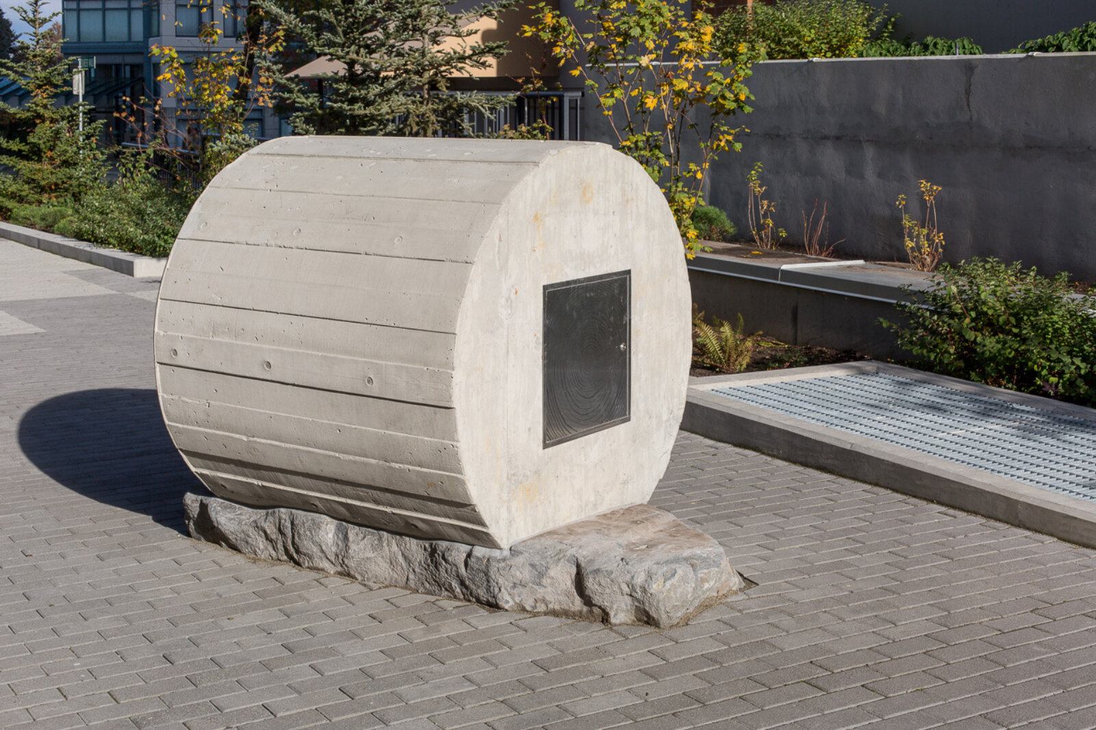 Devon Knowles, Total Running Time, 2015, concrete, glass, basalt, LED, stainless steel, native plantings, dimensions variable. Installation view, Burnaby, Canada, 2015