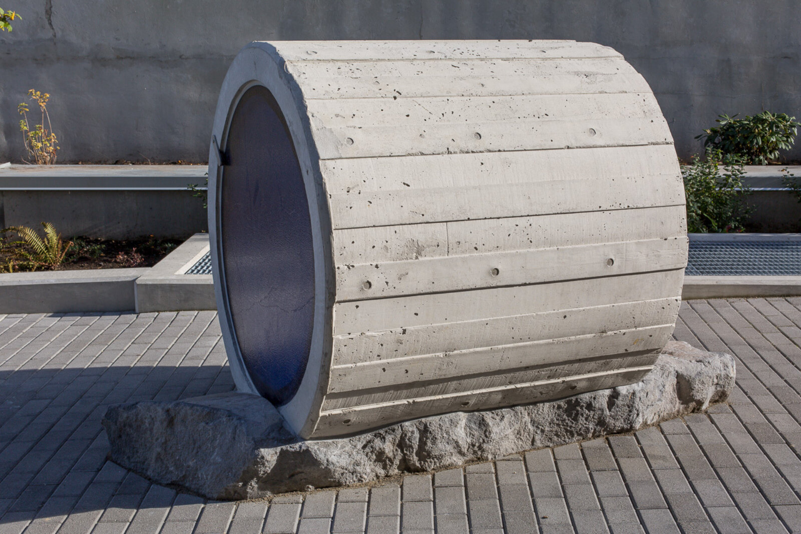 Devon Knowles, Total Running Time, 2015, concrete, glass, basalt, LED, stainless steel, native plantings, dimensions variable. Installation view, Burnaby, Canada, 2015