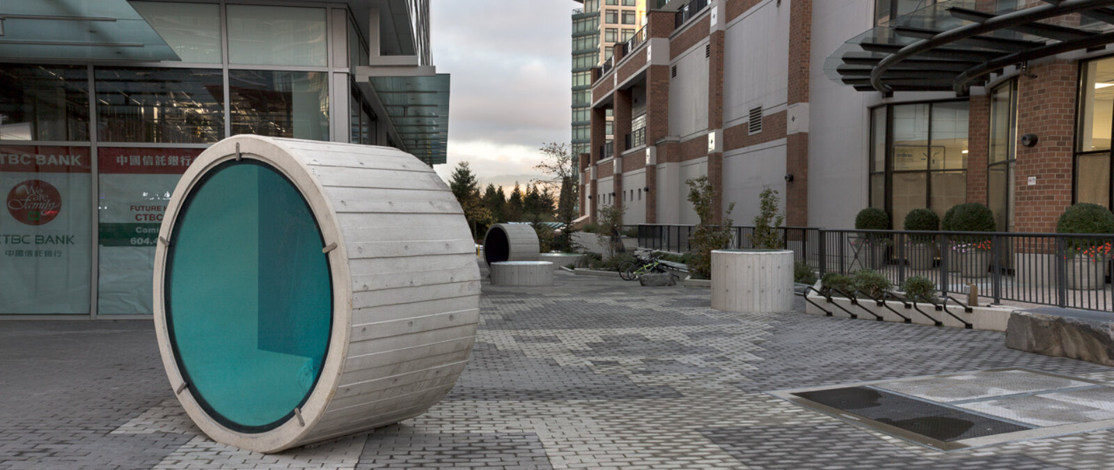 Devon Knowles, Total Running Time, 2015, concrete, glass, basalt, LED, stainless steel, native plantings, dimensions variable. Installation view, Burnaby, Canada, 2015
