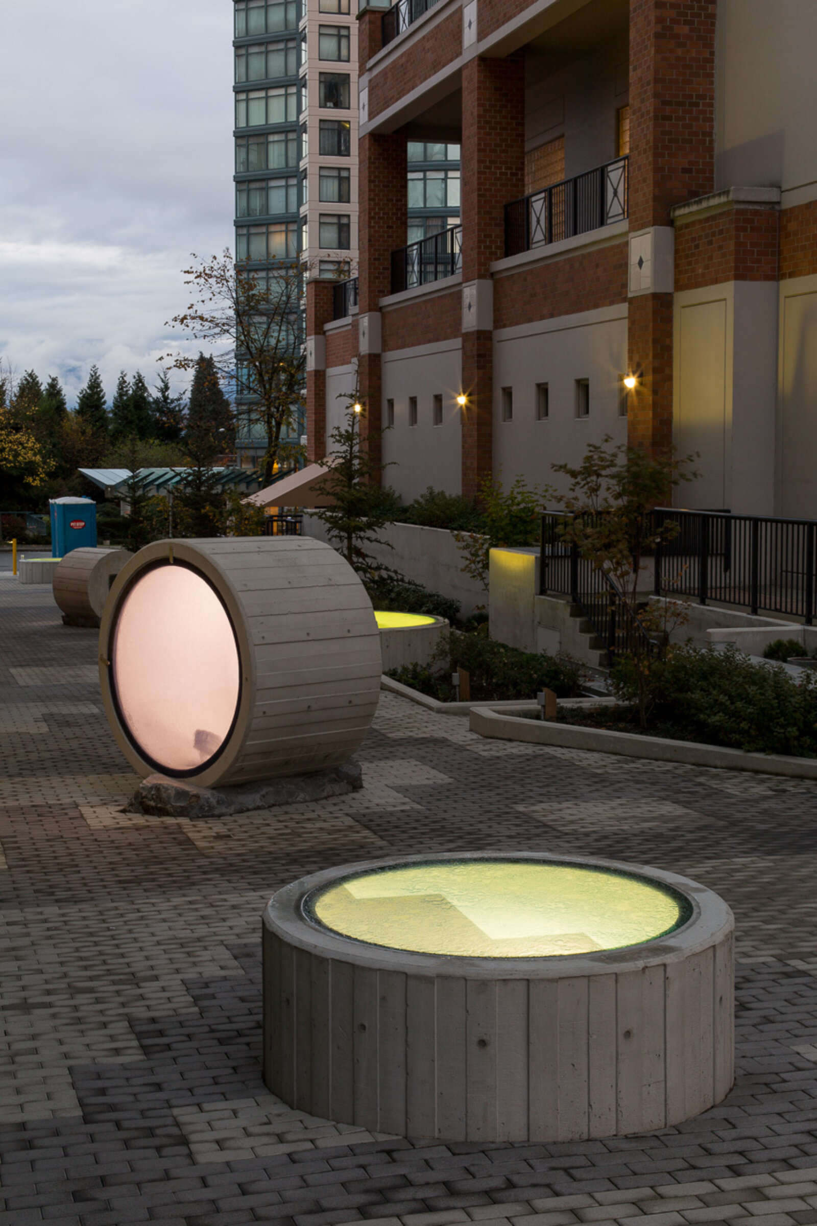 Devon Knowles, Total Running Time, 2015, concrete, glass, basalt, LED, stainless steel, native plantings, dimensions variable. Installation view, Burnaby, Canada, 2015