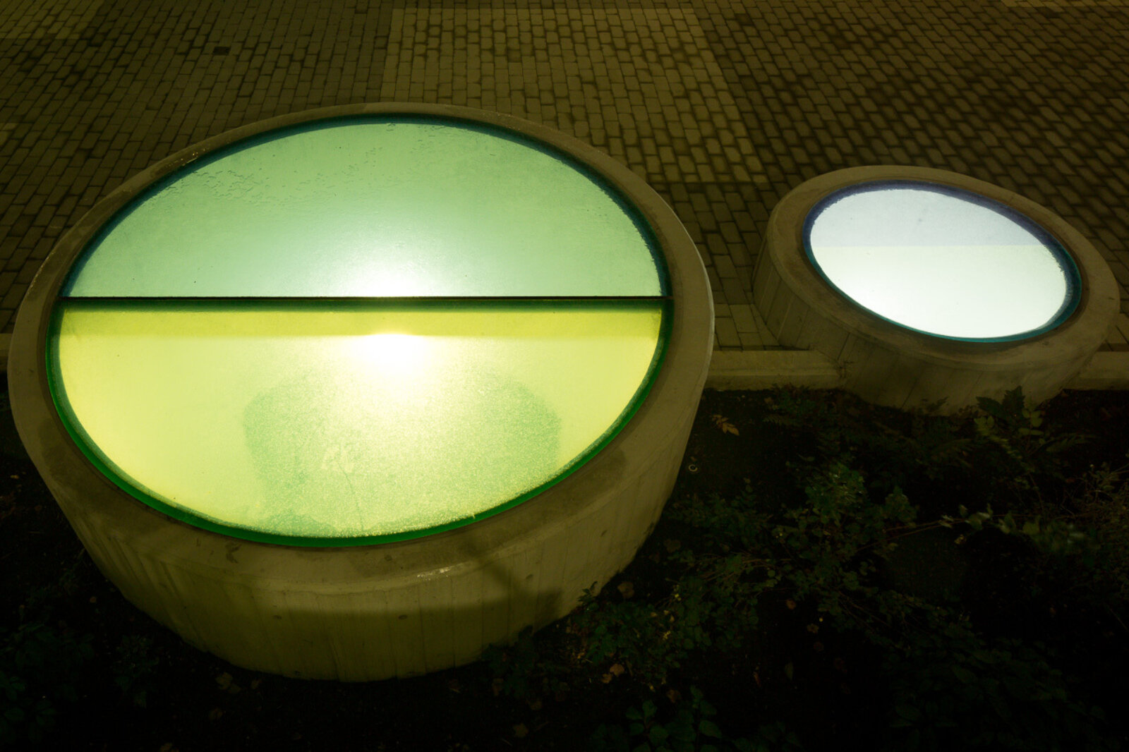 Devon Knowles, Total Running Time, 2015, concrete, glass, basalt, LED, stainless steel, native plantings, dimensions variable. Installation view, Burnaby, Canada, 2015