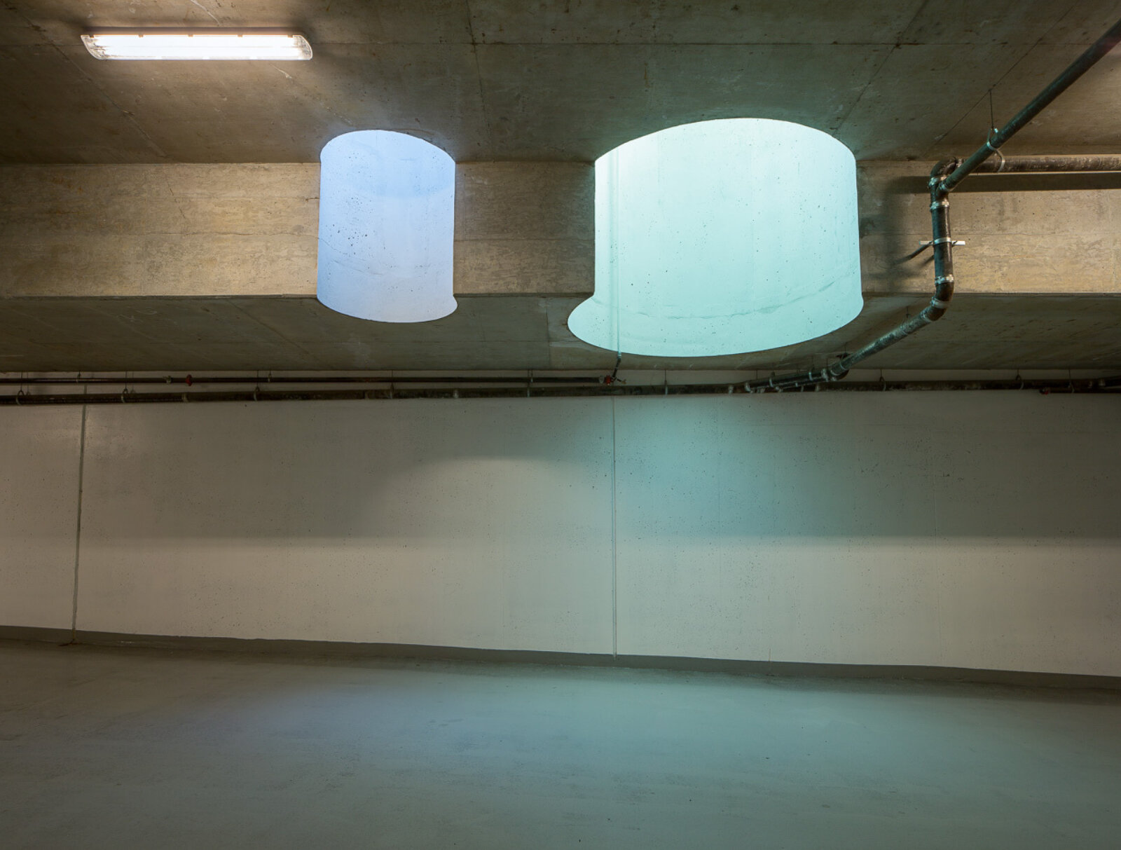 Devon Knowles, Total Running Time, 2015, concrete, glass, basalt, LED, stainless steel, native plantings, dimensions variable. Installation view, Burnaby, Canada, 2015