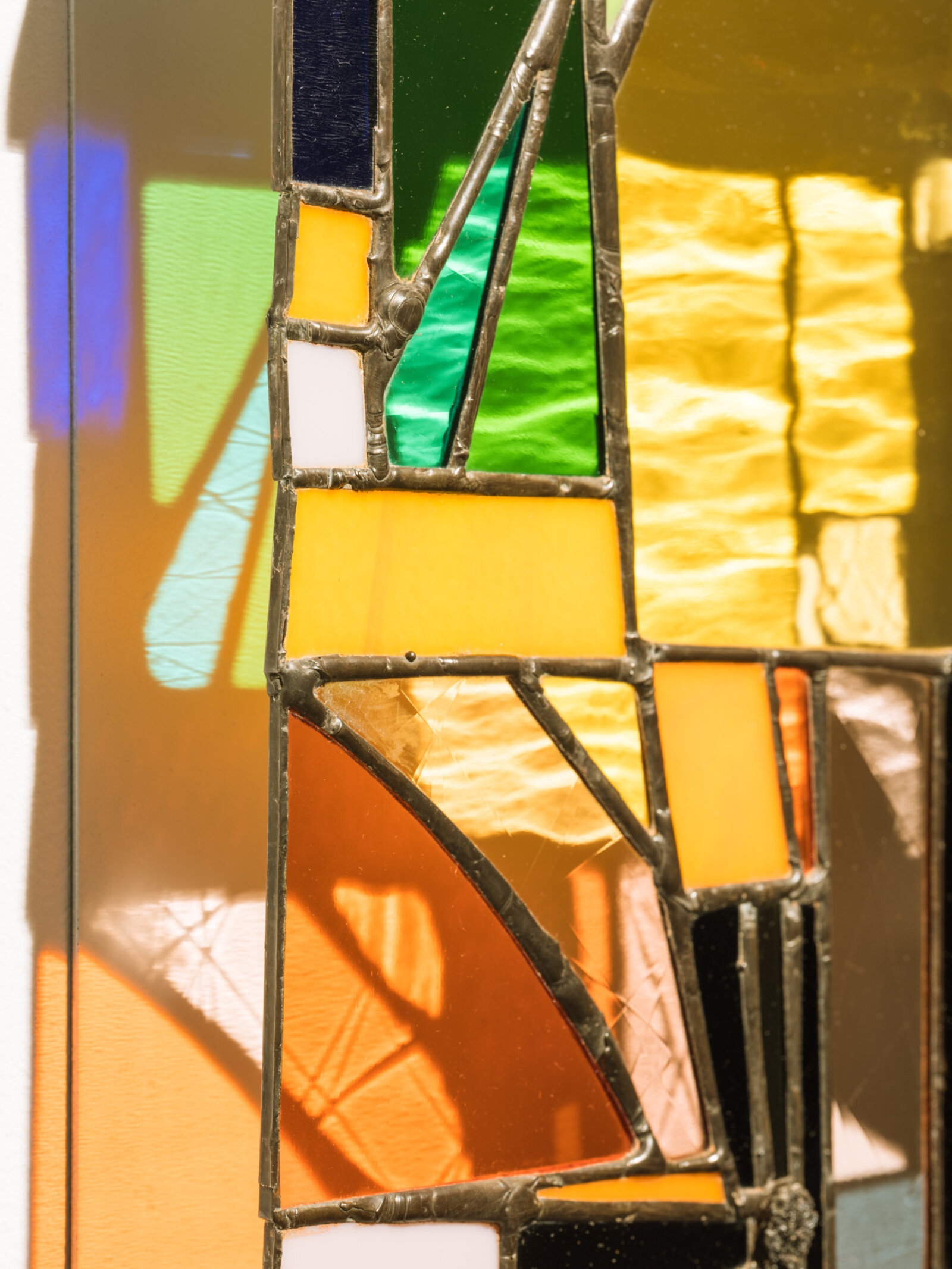 Devon Knowles, Walking Spectrum I S17 (detail), 2018, glass, plastic bag, plastic packaging, plastic ribbon, rolling paper packaging, CAD currency, lead, tin, asphalt, styrofoam, leaves, copper, steel, paint, 20 x 20 x 2 in. (51 x 51 x 5 cm)