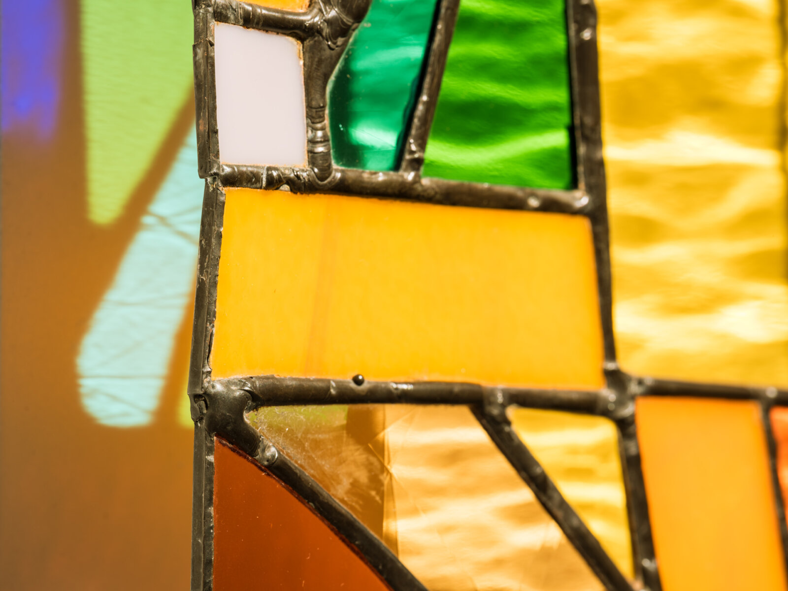 Devon Knowles, Walking Spectrum I S17 (detail), 2018, glass, plastic bag, plastic packaging, plastic ribbon, rolling paper packaging, CAD currency, lead, tin, asphalt, styrofoam, leaves, copper, steel, paint, 20 x 20 x 2 in. (51 x 51 x 5 cm)