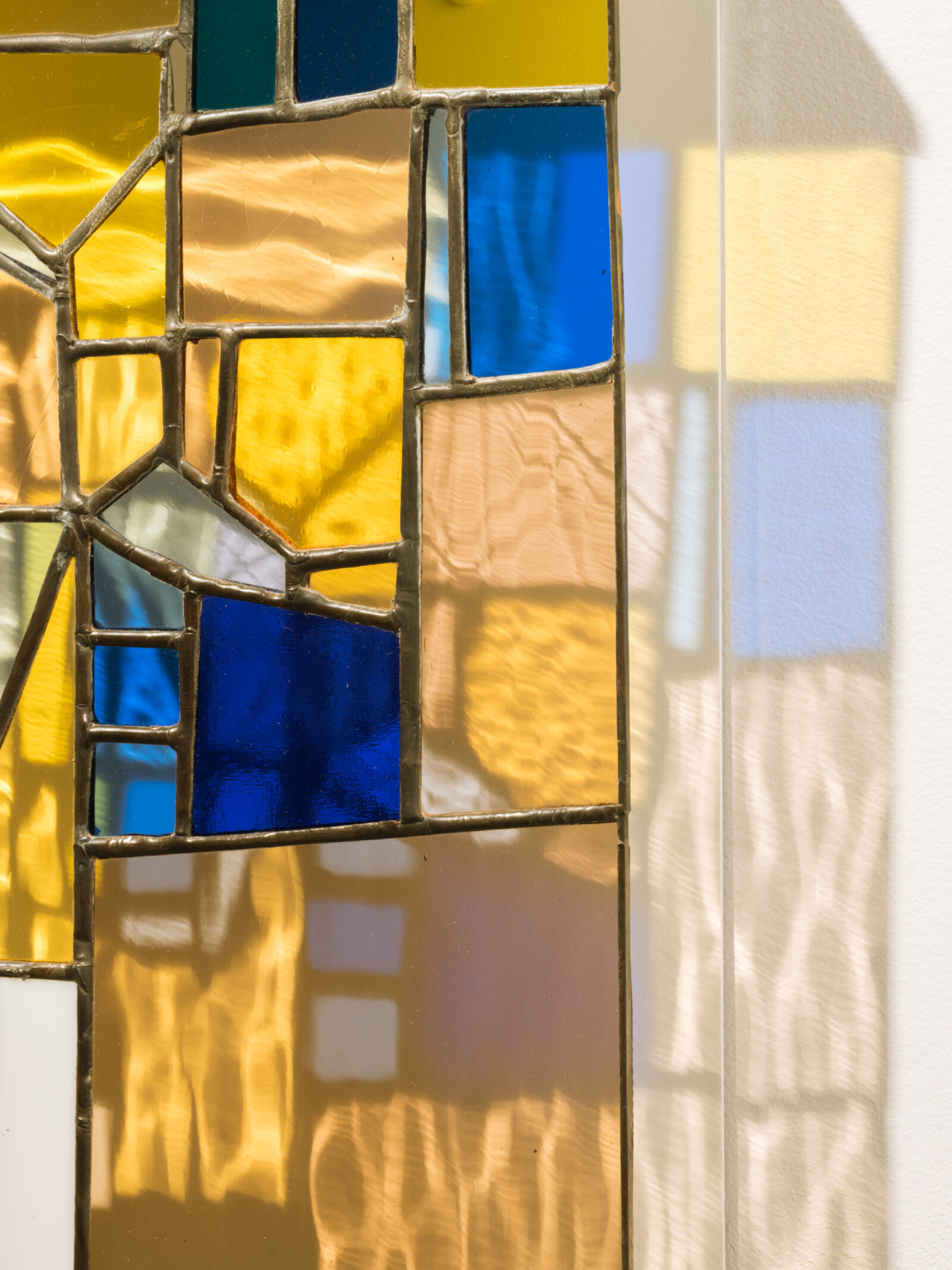 Devon Knowles, Walking Spectrum II, i, S17 (detail), 2018, glass, flower petals, iPod glass, paper cup, felt pen, reusable adhesive putty, lead, tin, steel, paint, 20 x 20 x 3 in. (51 x 51 x 8 cm)