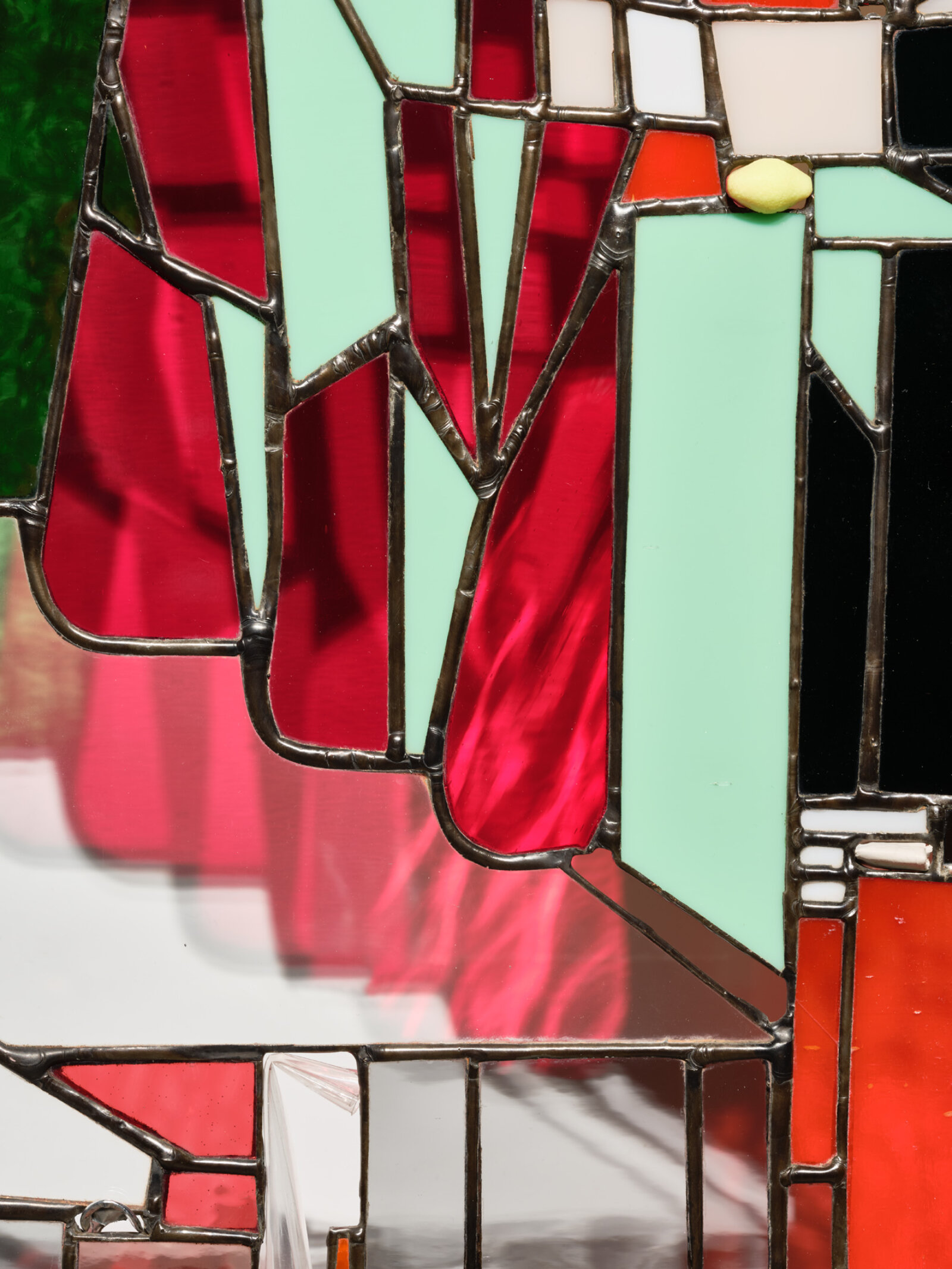 Devon Knowles, Walking Spectrum, III, i, S18 (detail), 2019, glass, aluminum tabs, cellophane envelope, plastic lid, foam earplug, steel zipper, paper receipt, lead, tin, steel, paint, 20 x 20 x 3 in. (51 x 51 x 8 cm)