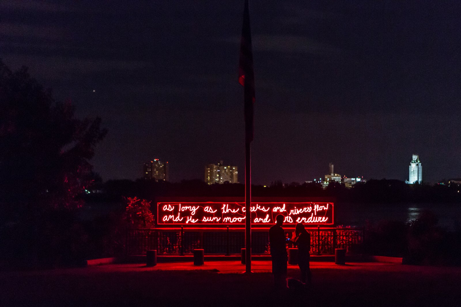 Duane Linklater, In Perpetuity, 2017, neon, transformers, aluminum, polycarbonate, and handwritten text by Sassa Linklater, 59 x 360 x 9 in. (150 x 914 x 23 cm). Installation view, Monument Lab: A Public Art and History Project, Mural Arts Philadelphia at Penn Treaty Park, Philadelphia, 2017