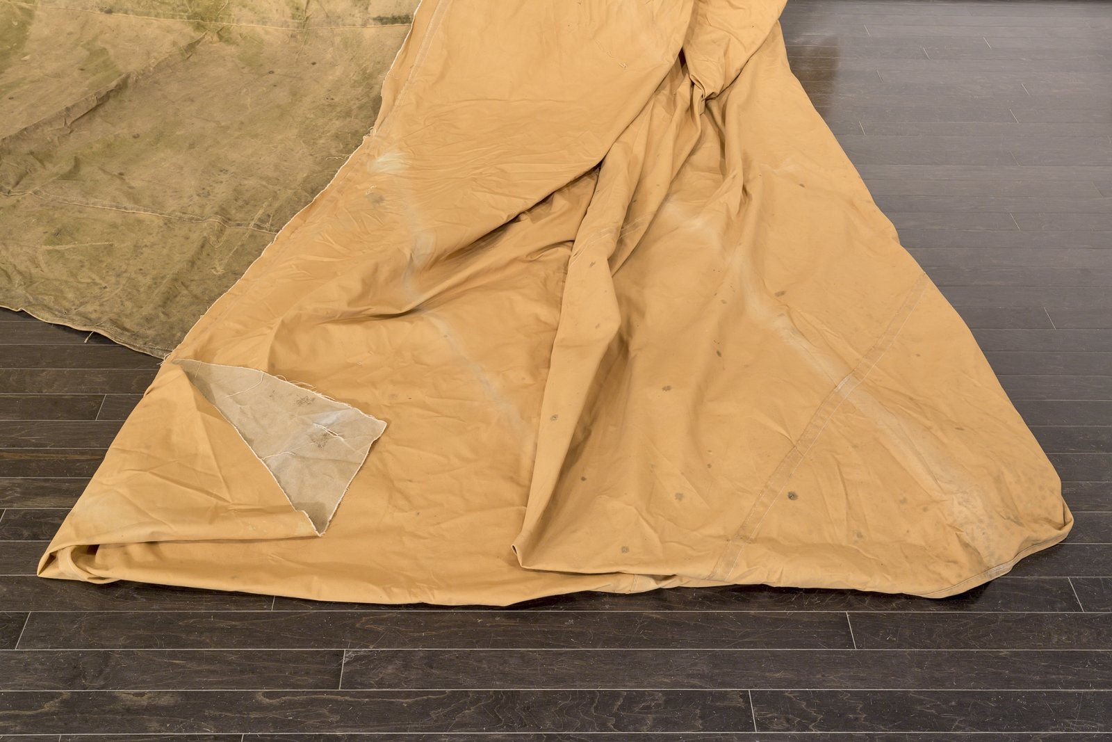 Duane Linklater, a gift from Doreen (detail), 2016, teepee canvas, nails, dimensions variable. Installation view, A Parallel Excavation, Art Gallery of Alberta, Edmonton, Canada, 2016