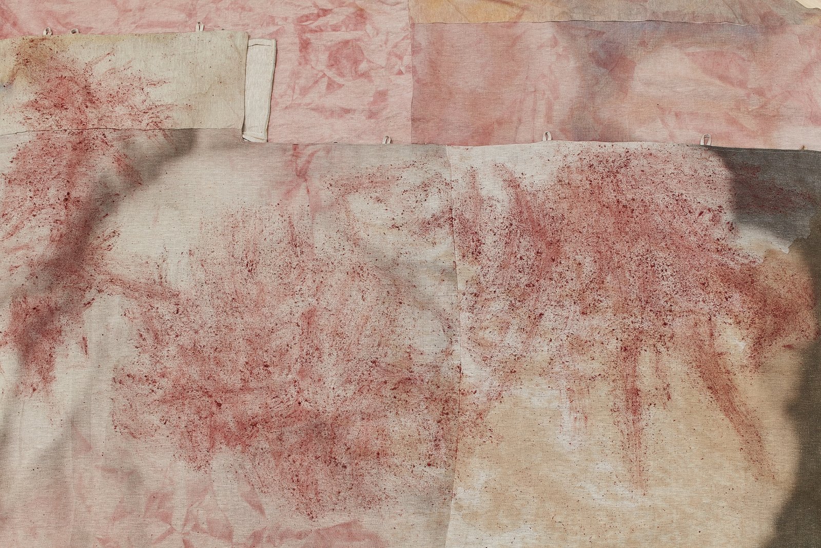 Duane Linklater, can the circle be unbroken 5 (detail), 2019, digital print on linen, black walnut dye, iron red dye, black tea, charcoal, 71 x 108 in. (180 x 274 cm). Installation view, SOFT POWER, SF MOMA, San Francisco, USA, 2019