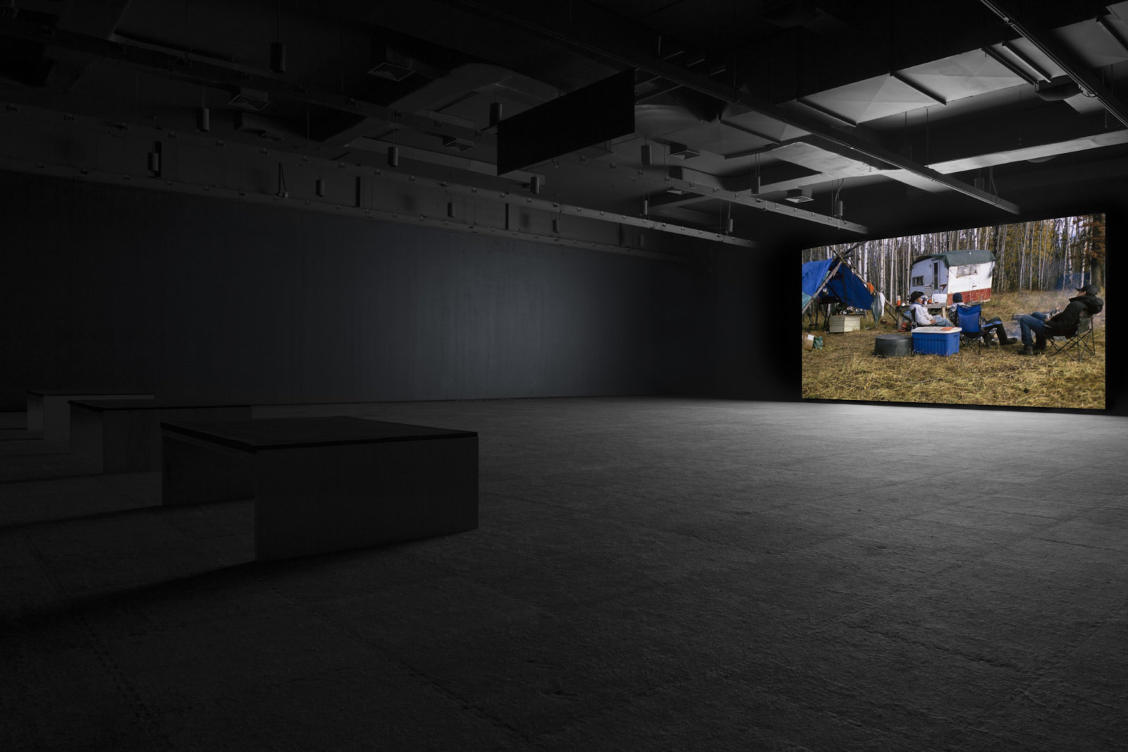 Brian Jungen and Duane Linklater, Modest Livelihood, 2012, super 16mm film, transferred to blu-ray, 50 minutes, silent. Installation view, Walter Phillips Gallery, Banff, 2012.