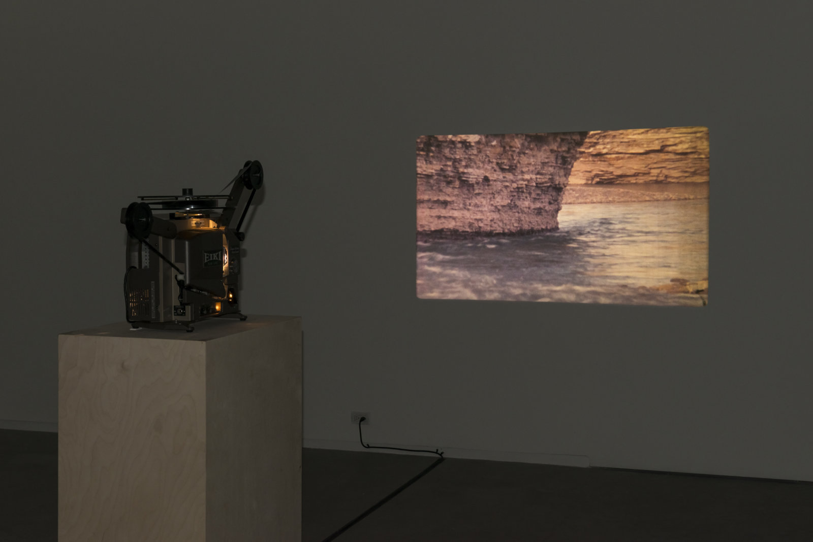 Brian Jungen and Duane Linklater, Stalker, 2013, super 16 mm film loop on projector, 2 minutes, 54 seconds