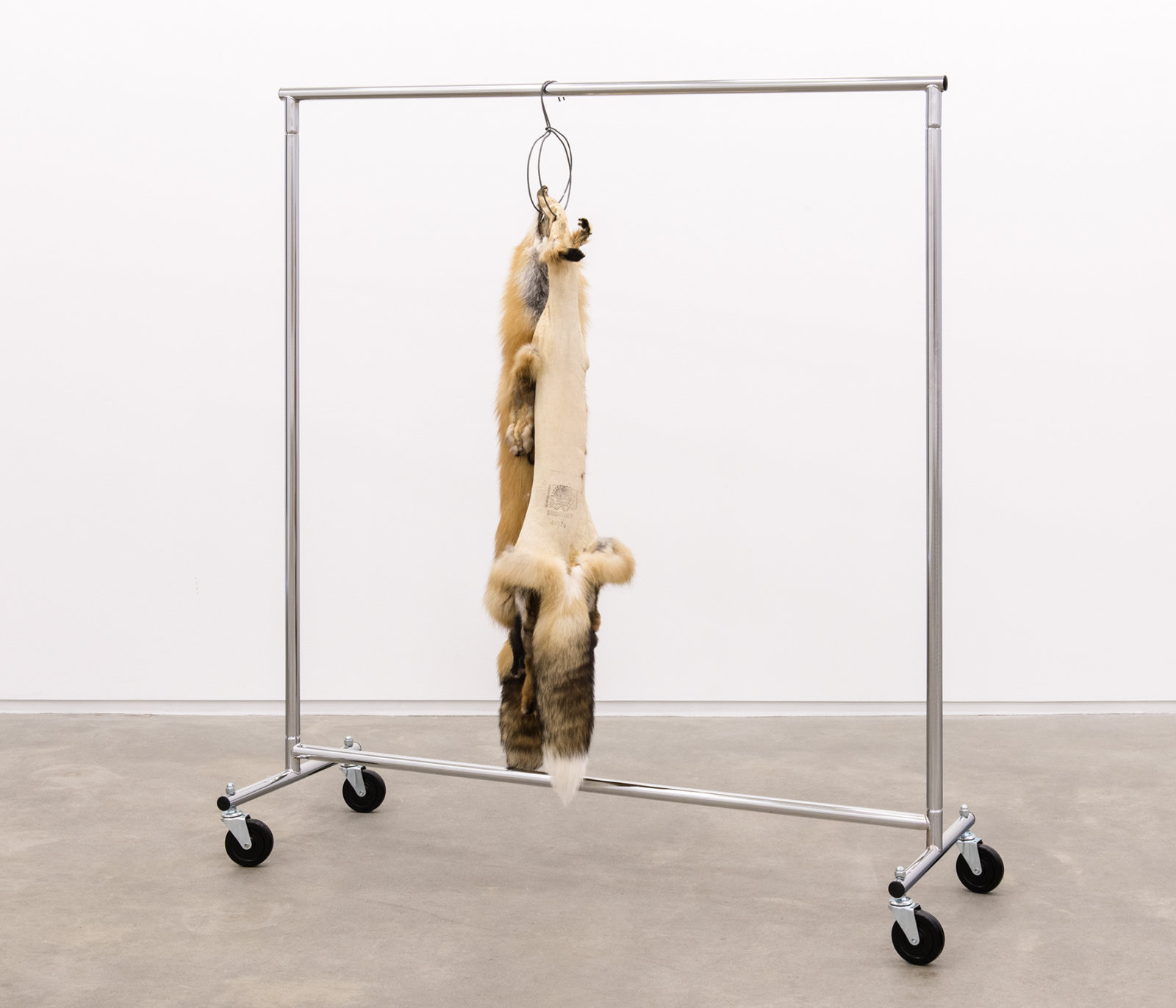 Duane Linklater, Kiss, 2014, fox furs, garment rack, hangers, 66 x 60 x 20 in. (168 x 151 x 52 cm)