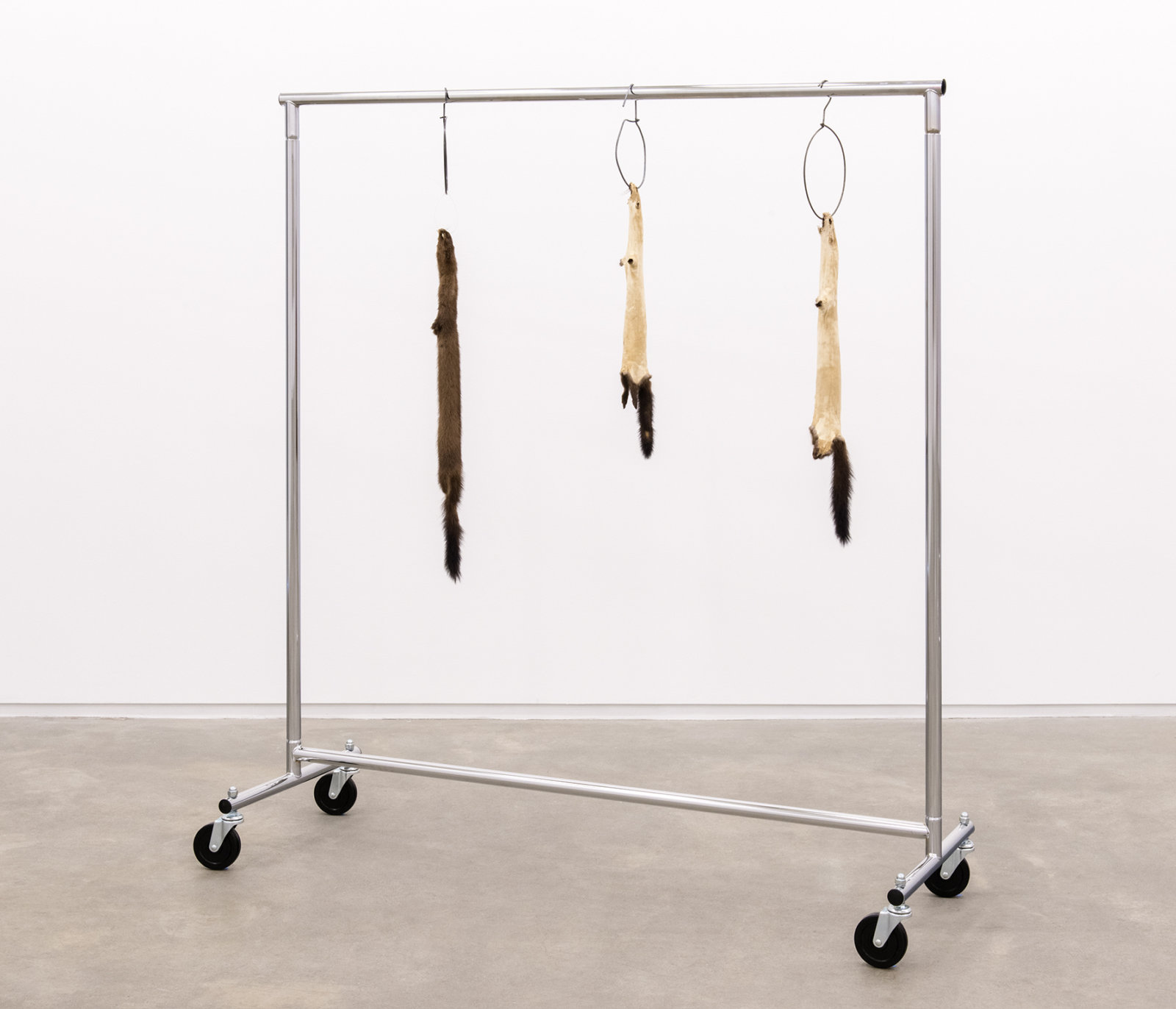 Duane Linklater, Little ghosts, 2014, mink furs, garment rack, plastic cable tie, hangers, 66 x 60 x 20 in. (168 x 151 x 52 cm)