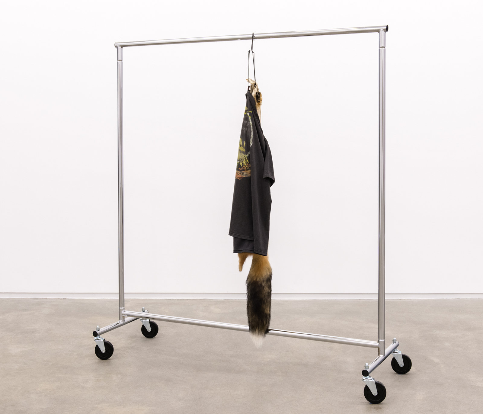 Duane Linklater, My brother in law, my sister, 2014, fox fur, garment rack, hangers, t-shirt, 66 x 60 x 20 in. (168 x 151 x 52 cm)