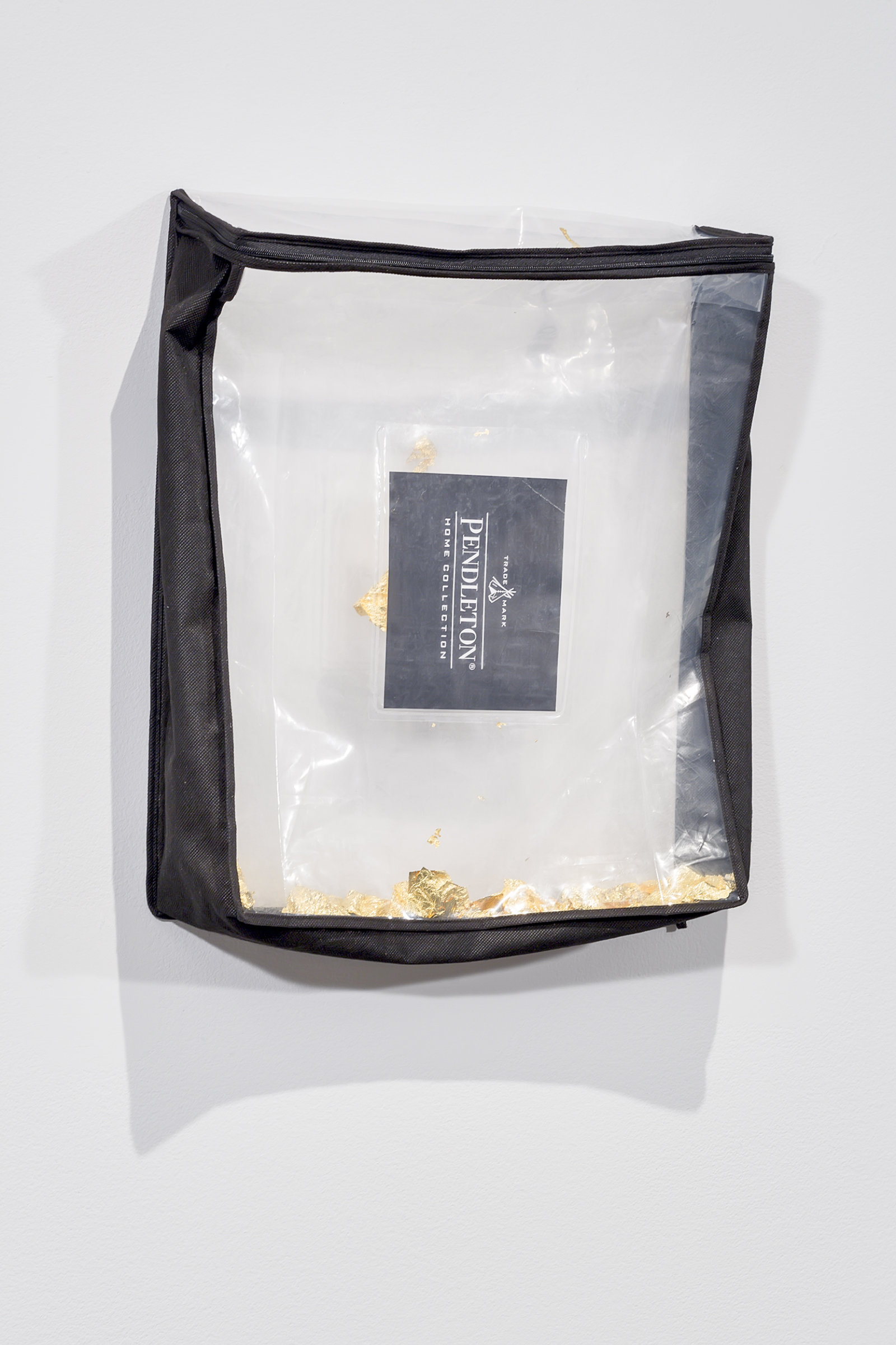 Duane Linklater, Trademark, 2016, gold leaf, plastic bag, 19 x 16 x 4 in. (48 x 40 x 9 cm)