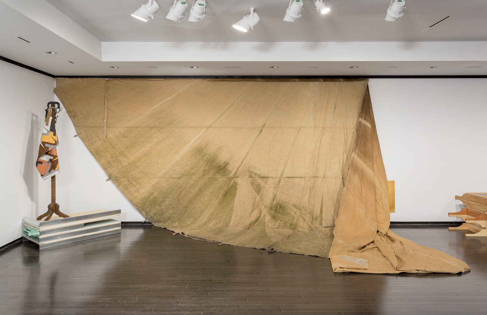 Duane Linklater, a gift from Doreen, 2016, tipi canvas, nails, dimensions variable. Installation view, A Parallel Excavation, Art Gallery of Alberta, Edmonton, Canada, 2016