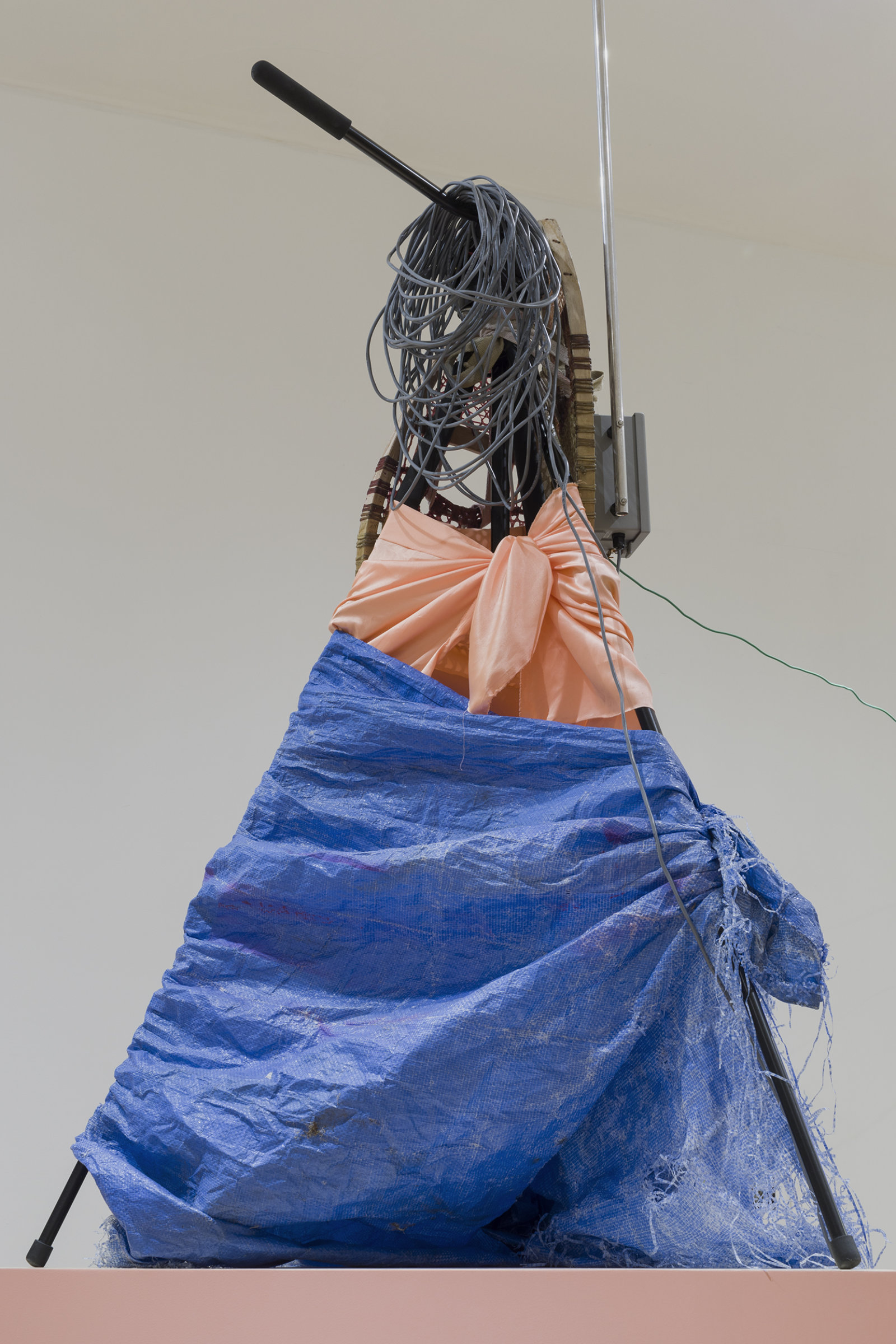 Duane Linklater, apparatus for the dissemination of Indigenous ideas and sounds into the air (detail), 2017, tripod, radio transmitter, hand-dyed snowshoes, tarpaulin, fabric, string, stone, tape, speaker, paint, wiring, wiring, dimensions variable. Installation view, apparatus for the circulation of Indigenous ideas and sounds into the air, Western Front, Vancouver, 2017