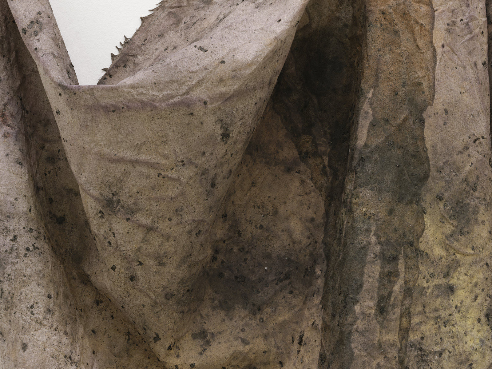 Duane Linklater, crust cloth remnant (detail), 2021, linen, cochineal dye, yellow ochre, honey, charcoal, nails, 66 x 56 x 7 in. (168 x 141 x 18 cm)