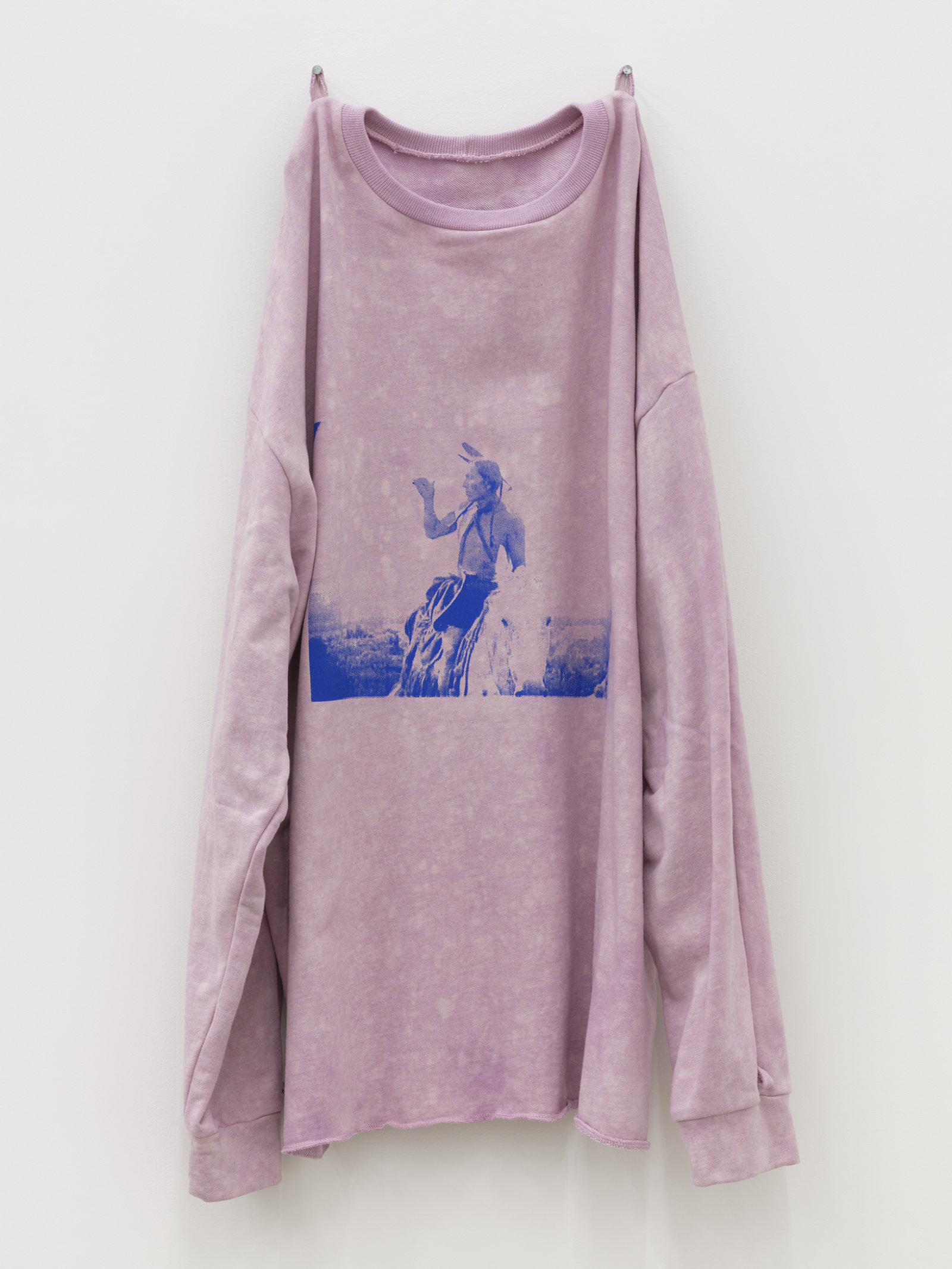 Duane Linklater, whiteeagle, 2020, handmade sweater, cochineal dye, silkscreen, nails, 38 x 20 x 5 in. (97 x 51 x 13 cm)