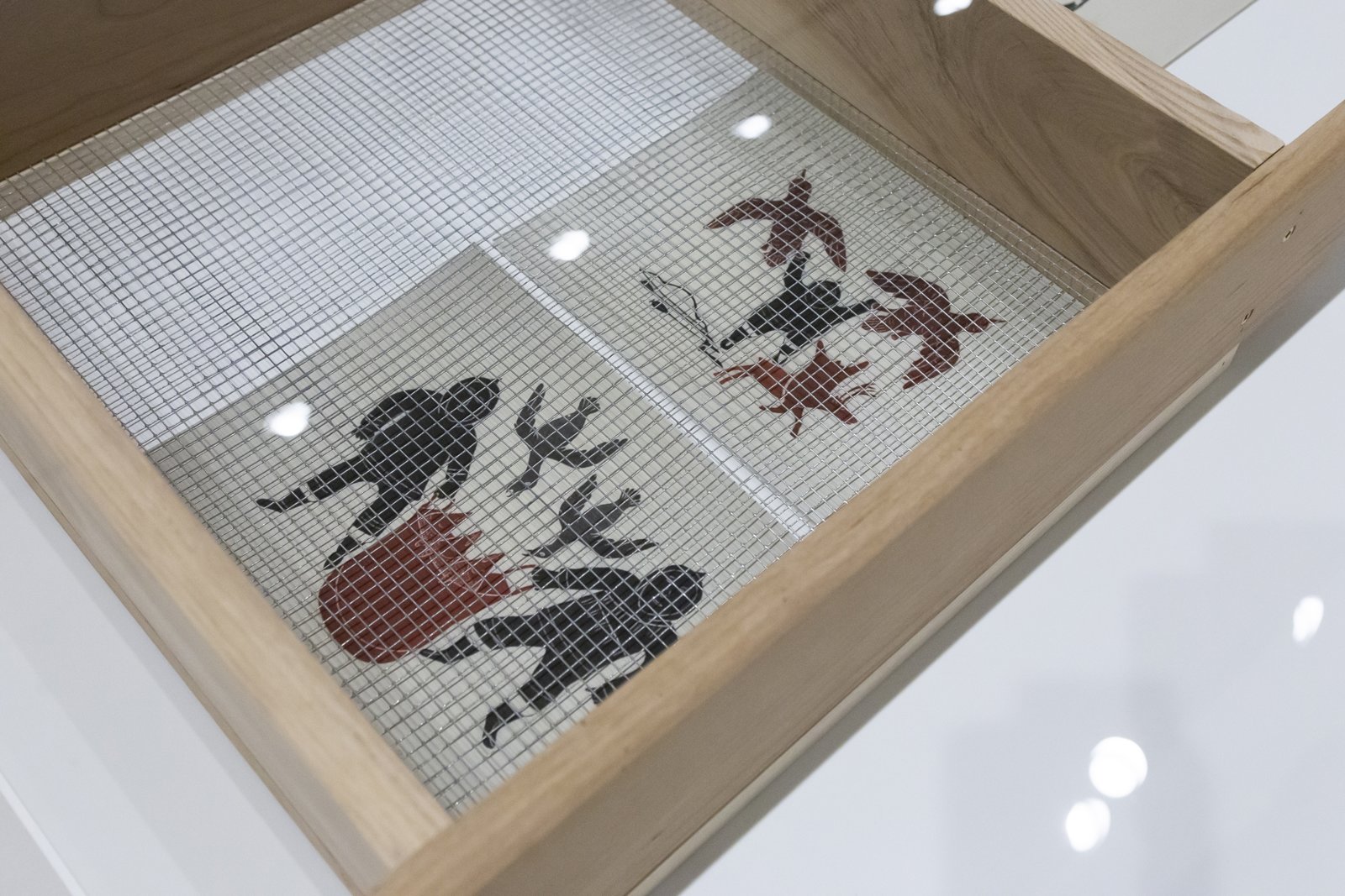 Tanya Lukin Linklater, Horse Hair Question 2 (detail), 2016, wood, hardware, screen, horse hair bundles, cotton, paper, images of Inuit prints from Art Gallery of Alberta’s collection, dimensions variable. Installation view, Next Year’s Country, Remai Modern, Saskatoon, Canada, 2020