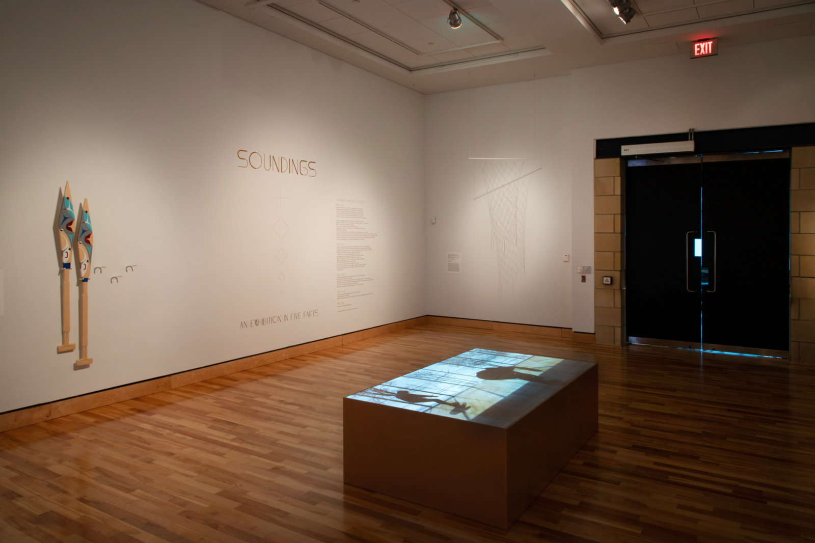 Tanya Lukin Linklater, We wear one another, 2019⁠, site-specific performance projected on wood plinth, 48 x 24 x 85 in. (122 x 61 x 216 cm), 25 minutes, 18 seconds. Installation view, Soundings, The Rooms, St. John's, Canada, 2022