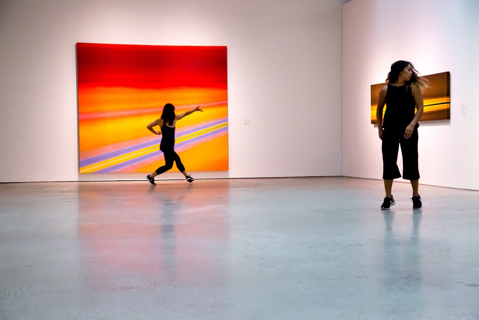 Tanya Lukin Linklater, Sun Force, 2017, site-specific performance with dancers Ceinwen Gobert and Danah Rosales in response to Fire and Light, an exhibition of Rita Letendre's paintings at the Art Gallery of Ontario, Toronto, Canada, 2017