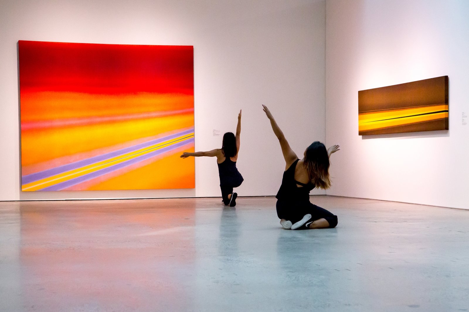 Tanya Lukin Linklater, Sun Force, 2017, site-specific performance with dancers Ceinwen Gobert and Danah Rosales in response to Fire and Light, an exhibition of Rita Letendre's paintings at the Art Gallery of Ontario, Toronto, Canada, 2017