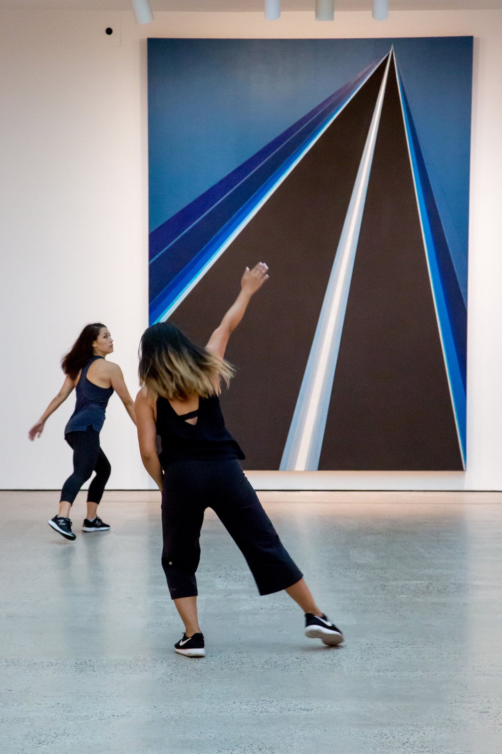 Tanya Lukin Linklater, Sun Force, 2017, site-specific performance with dancers Ceinwen Gobert and Danah Rosales in response to Fire and Light, an exhibition of Rita Letendre's paintings at the Art Gallery of Ontario, Toronto, Canada, 2017