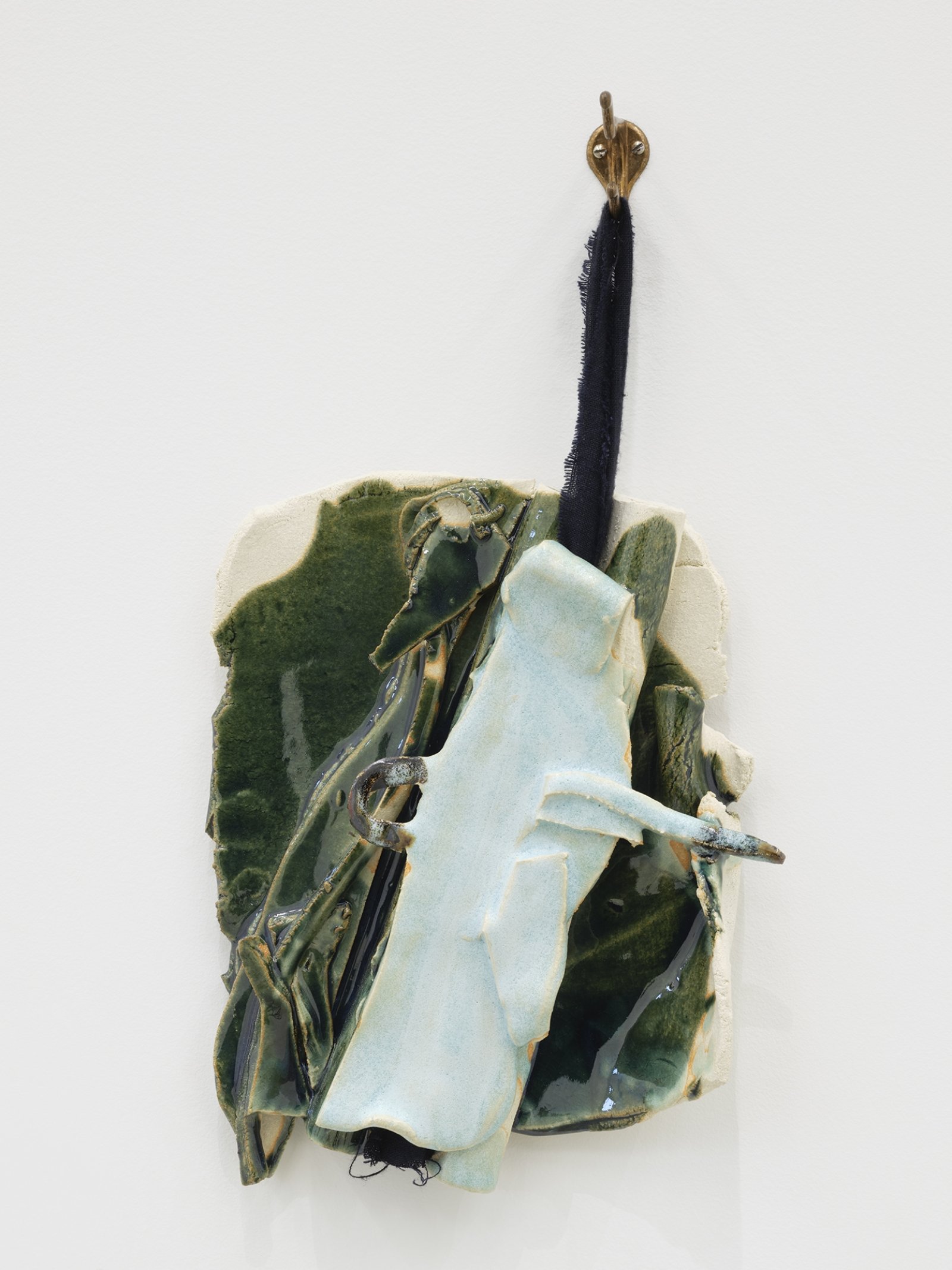 Christina Mackie,  Token no. 12, 2019, stoneware, linen, coat hook, 18 x 10 in. (45 x 24 cm) by Christina Mackie