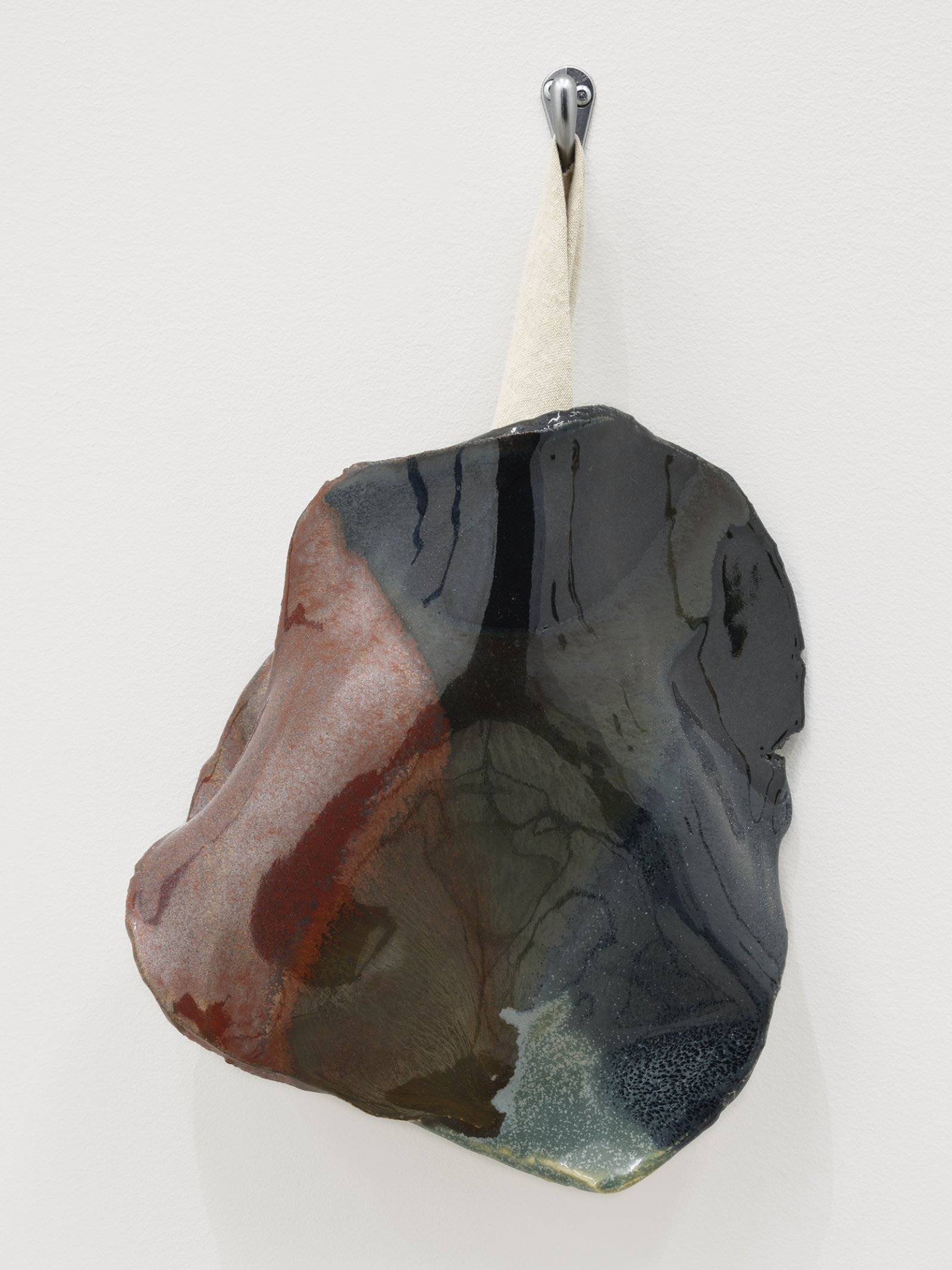 ​Christina Mackie, Token no. 6, 2019, stoneware, linen, coat hook, 15 x 9 in. (37 x 22 cm) by Christina Mackie