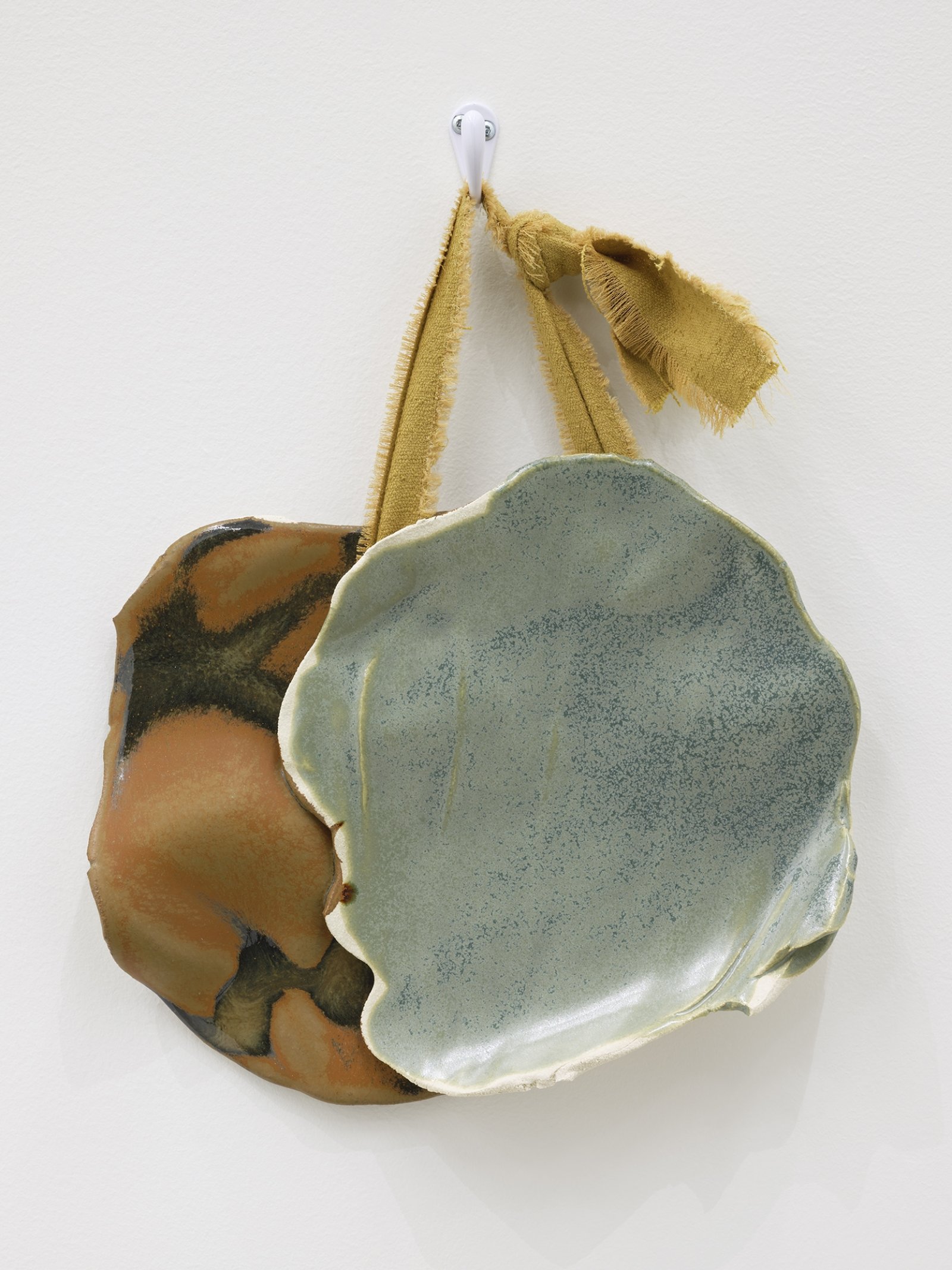 ​Christina Mackie, Token no. 9, 2019, stoneware, silk, coat hook, 15 x 11 in. (37 x 28 cm) by Christina Mackie