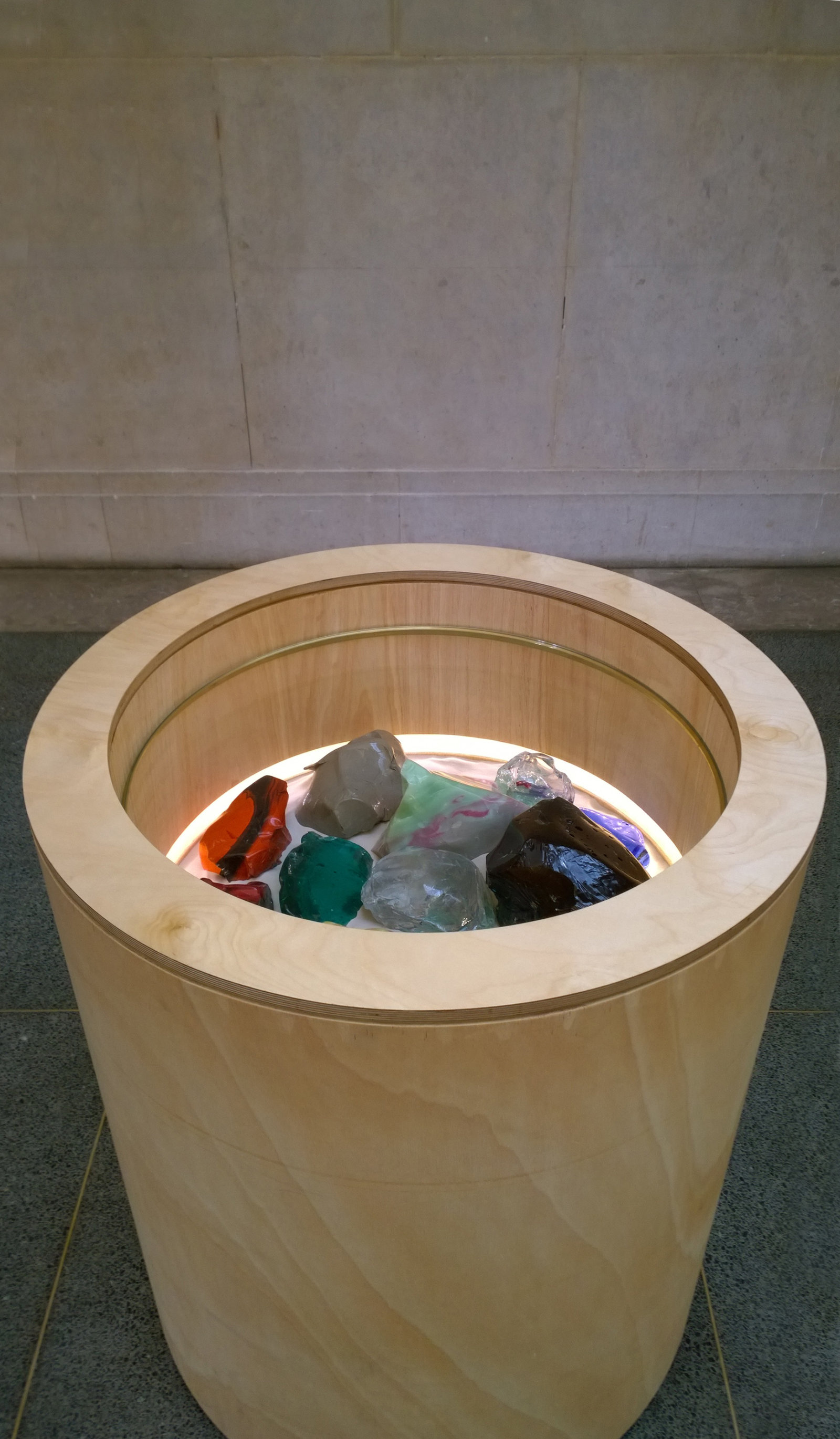 Christina Mackie, Cullet bin, 2015, wood, sand, glass, amiran, brass, batteries, led lights, lock, 46 x 38 x 38 in. (118 x 97 x 97 cm). Installation view, the filters, Tate Britain, London, UK, 2015