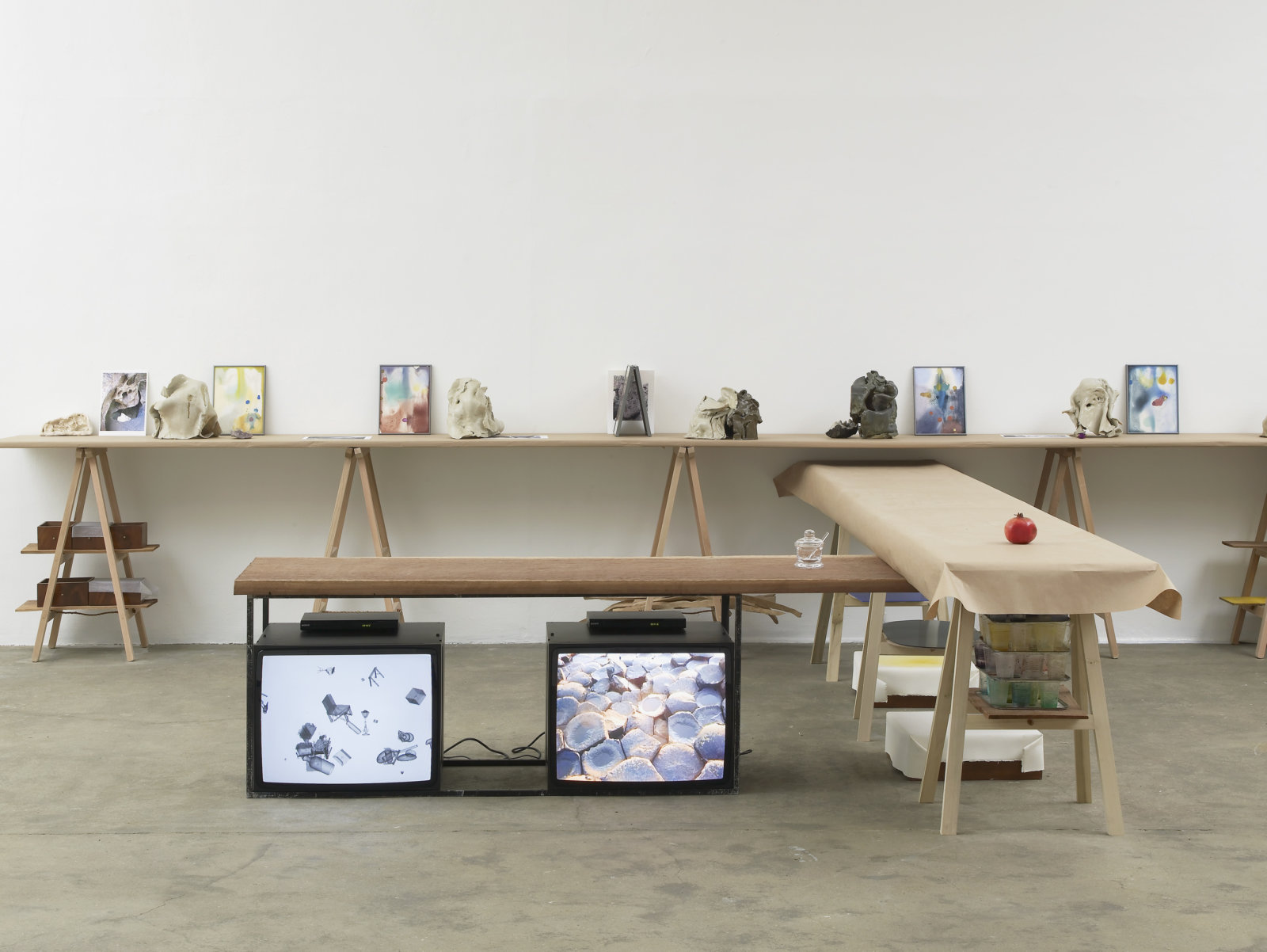 Christina Mackie, Fall Force and Planet, 2012, hantarax monitors, mahogany, glass jar, 2 DVDs, 4 minutes and 8 minutes, dimensions variable. Installation view, Painting the Weights, Chisenhale Gallery, London, UK, 2012