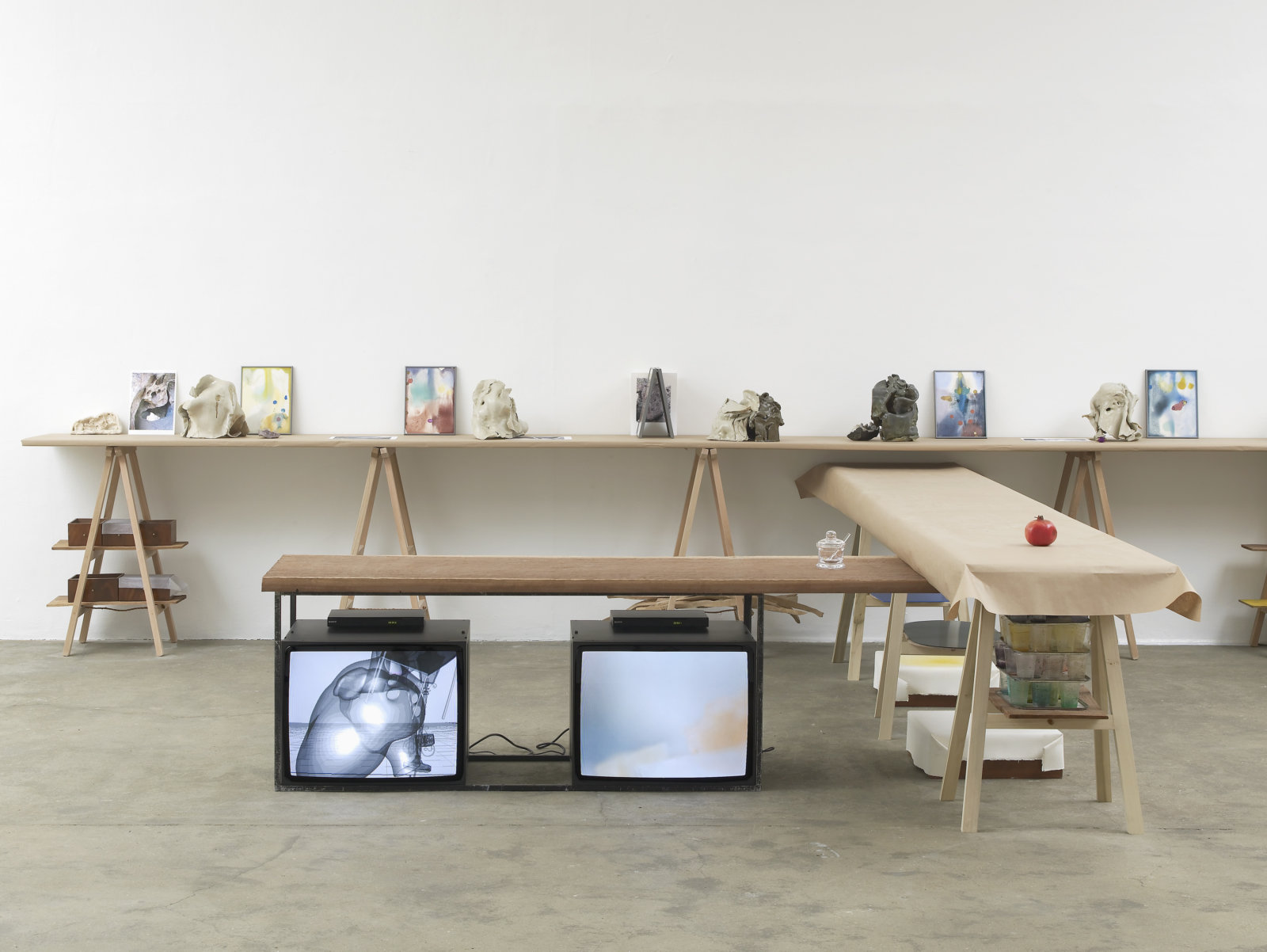 Christina Mackie, Fall Force and Planet, 2012, hantarax monitors, mahogany, glass jar, 2 DVDs, 4 minutes and 8 minutes, dimensions variable. Installation view, Painting the Weights, Chisenhale Gallery, London, UK, 2012